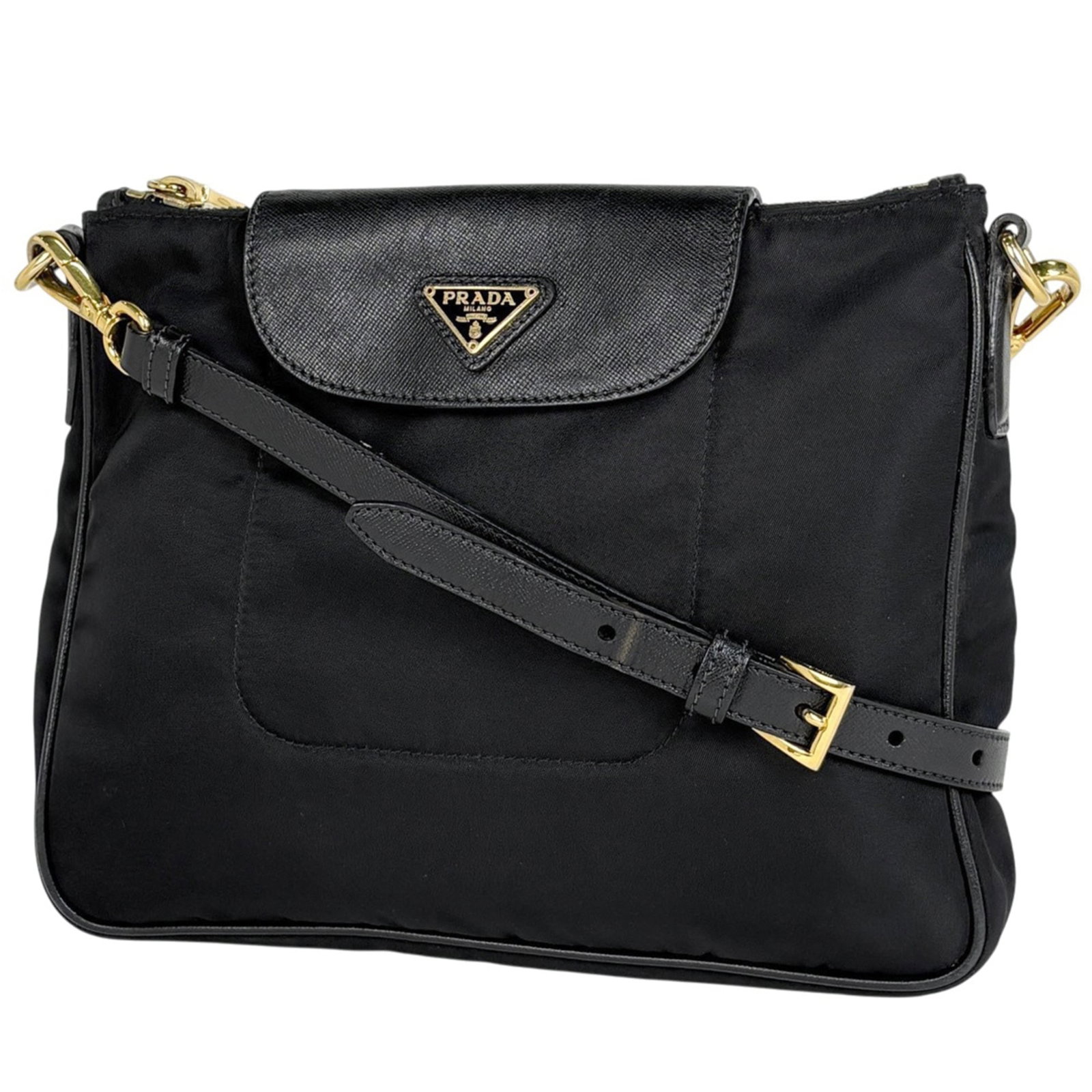 Shoulder Bag Nylon Leather by Prada: Shoulder Bag Nylon Leather by Prada Prada's Shoulder Bag Nylon Leather boasts sleek, modern design with a striking combination of nylon and leather materials. Measuring 20cm x 25cm x 4.5cm, it offers