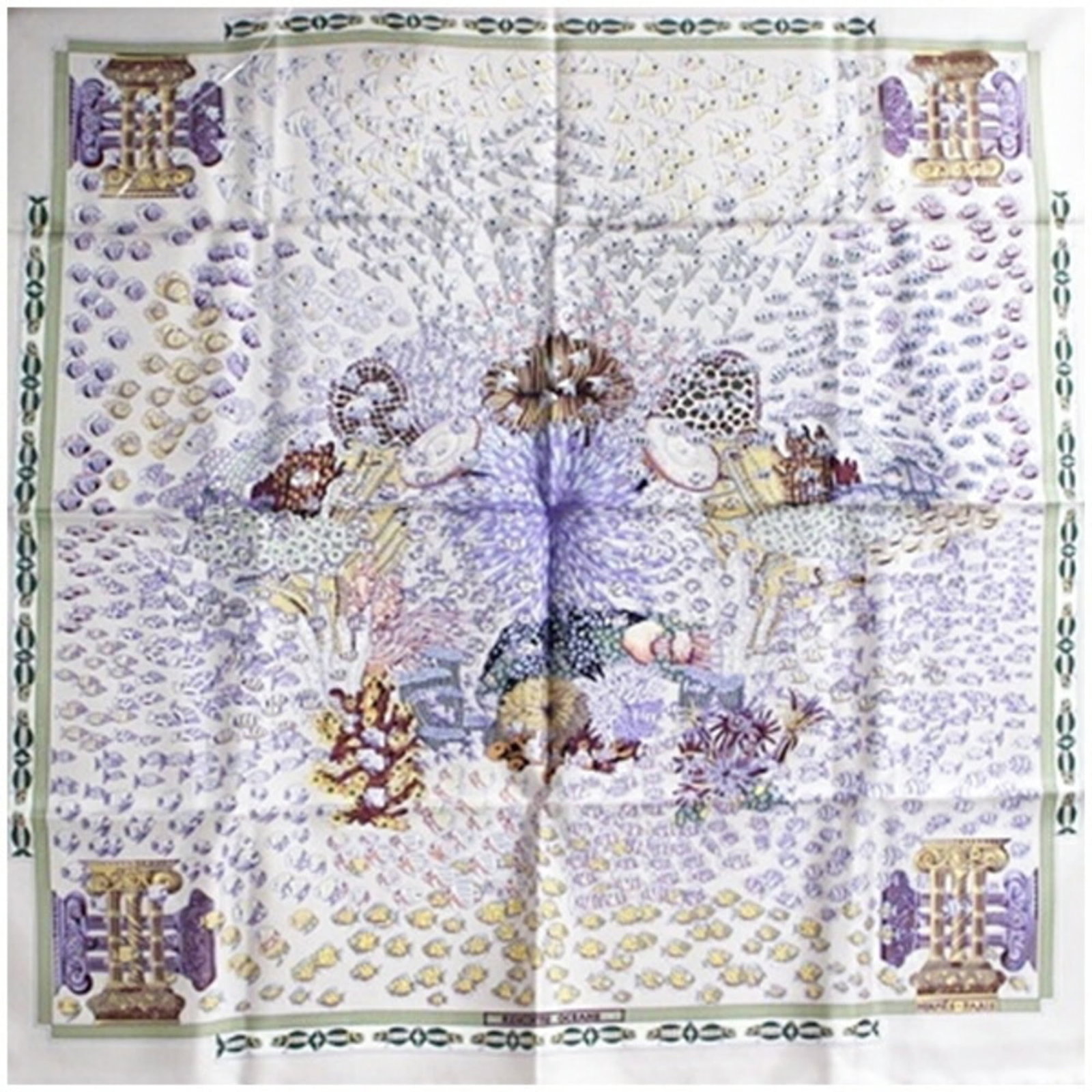 Hermes Scarf: Hermes Scarf Light gray and purple hues blend in perfect harmony, creating a sophisticated look with the Hermes scarf. This iconic accessory bears a signature, adding a touch of elegance to any outfit