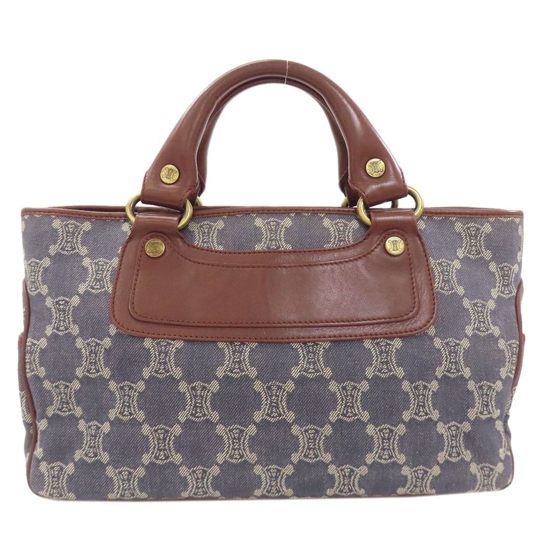 Boogie denim handbag bag leather Celine: Boogie denim handbag bag leather Celine Blue denim Celine handbag with blue exterior and leather interior. This unique style combines the ruggedness of denim with the sophistication of luxury leather.