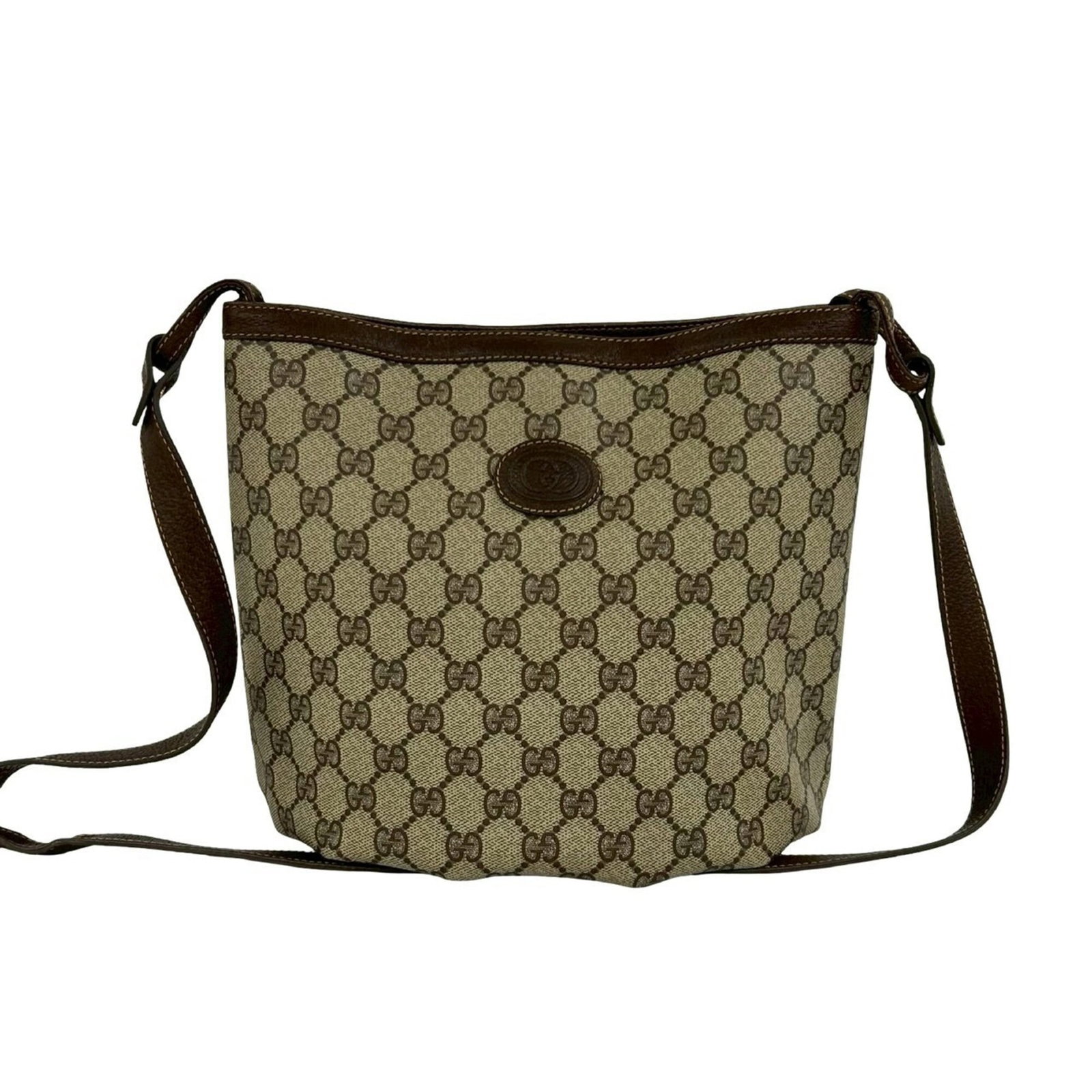 PVC leather bag shoulder pochette Gucci: PVC leather bag shoulder pochette Gucci Gucci's PVC leather pochette features a distinctive brown color and a compact size, measuring 22cm x 29.5cm x 11cm. The bag's material combines the durability o