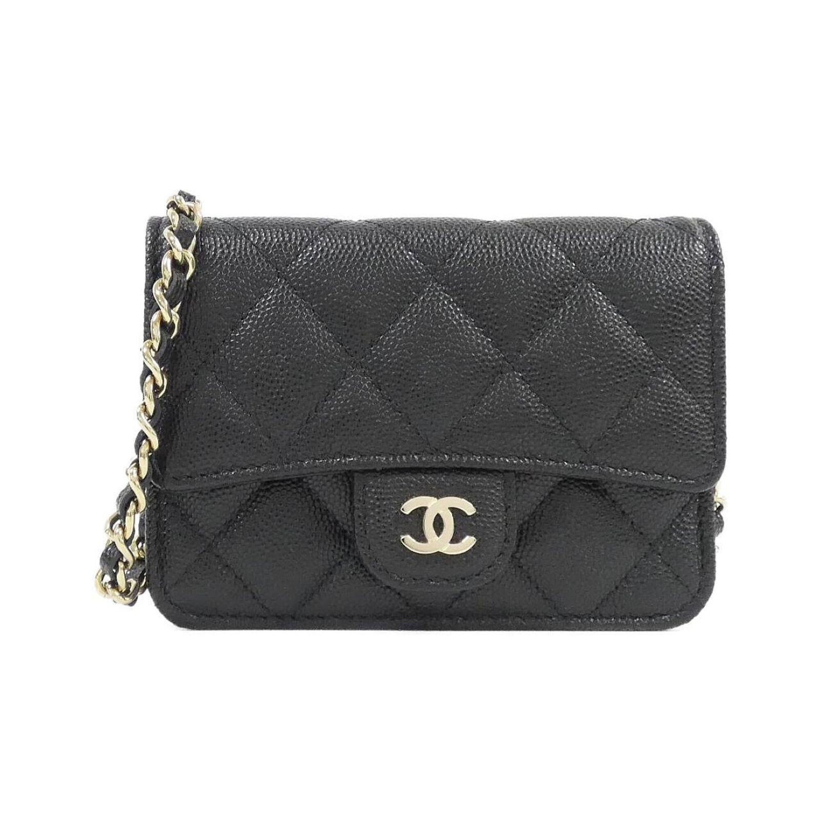 Calfskin handbag bag shoulder Chanel: Calfskin handbag bag shoulder Chanel Calfskin handbag bag shoulder from Chanel features a sleek black design with gold hardware, crafted from high-quality grained calfskin. Measuring 9cm x 12cm x