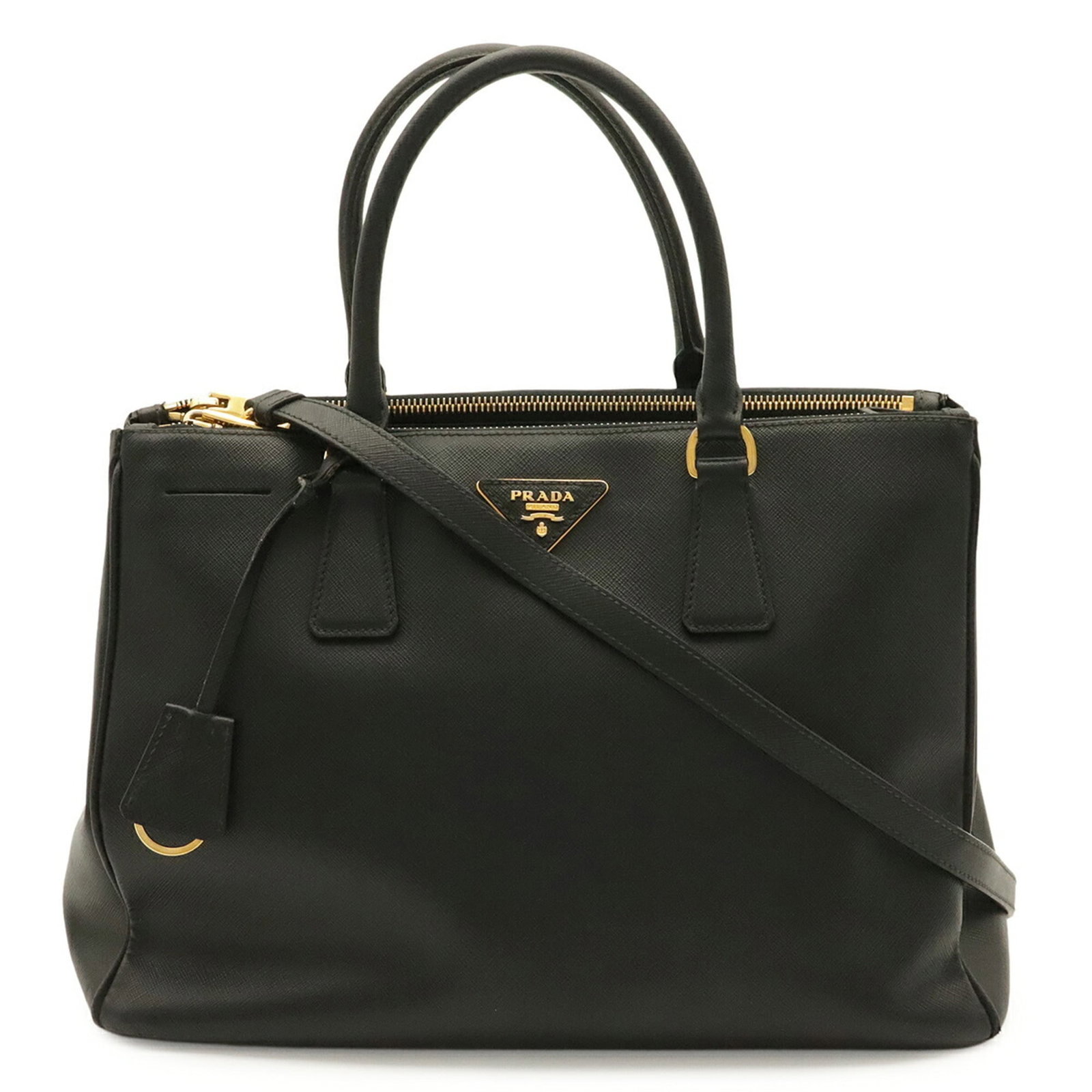 Shoulder Bag Prada Leather Handbag: Shoulder Bag Prada Leather Handbag This Prada Saffiano leather shoulder bag boasts sleek black and gold hardware, showcasing the iconic Italian brand's signature style. Measuring 24cm x 34cm x 15cm,