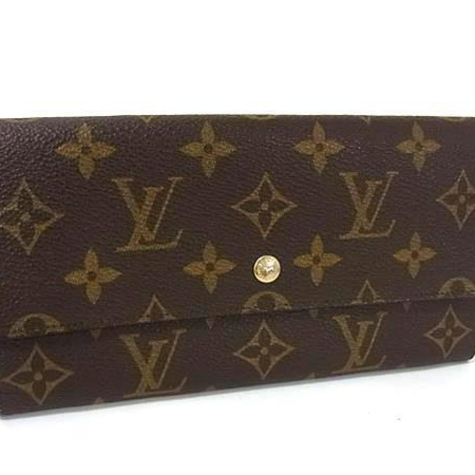 Louis Vuitton bi fold monogram wallet: Louis Vuitton bi fold monogram wallet Monogrammed with iconic Louis Vuitton design, this bi-fold wallet boasts classic French elegance. Made from high-quality monogram material, its timeless brown