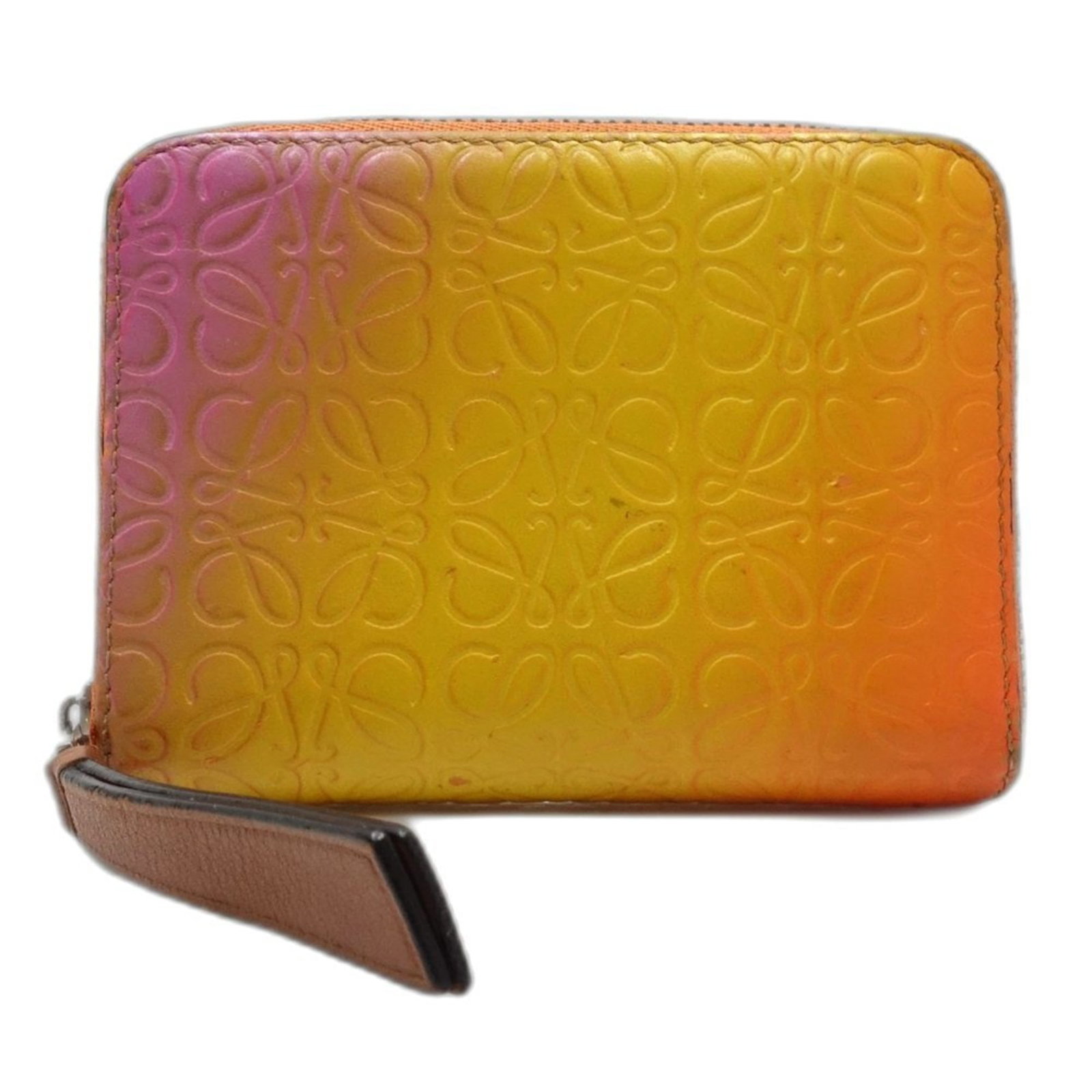 Coin Case Leather Purse Loewe: Coin Case Leather Purse Loewe The Loewe Coin Case Leather Purse boasts a vibrant multi-color design, featuring an orange accent. Made from high-quality leather, its compact size measures 8.5cm x 11cm