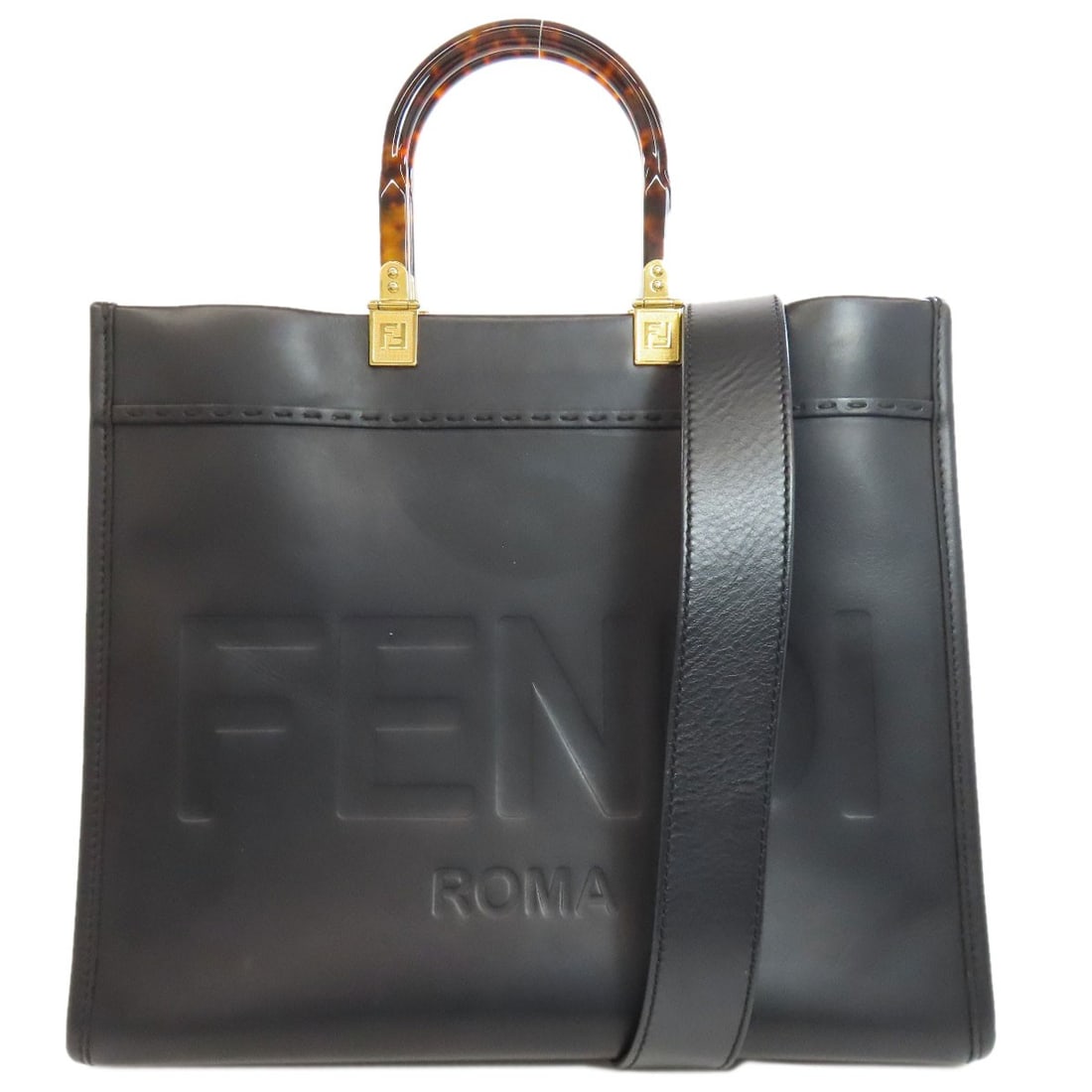 Fendi Sunshine Medium 2Way Handbag Calf: Fendi Sunshine Medium 2Way Handbag Calf Black Fendi Sunshine Medium 2Way Handbag Calf with black exterior and calf material. This stylish handbag features a 2-way design, showcasing its sleek and