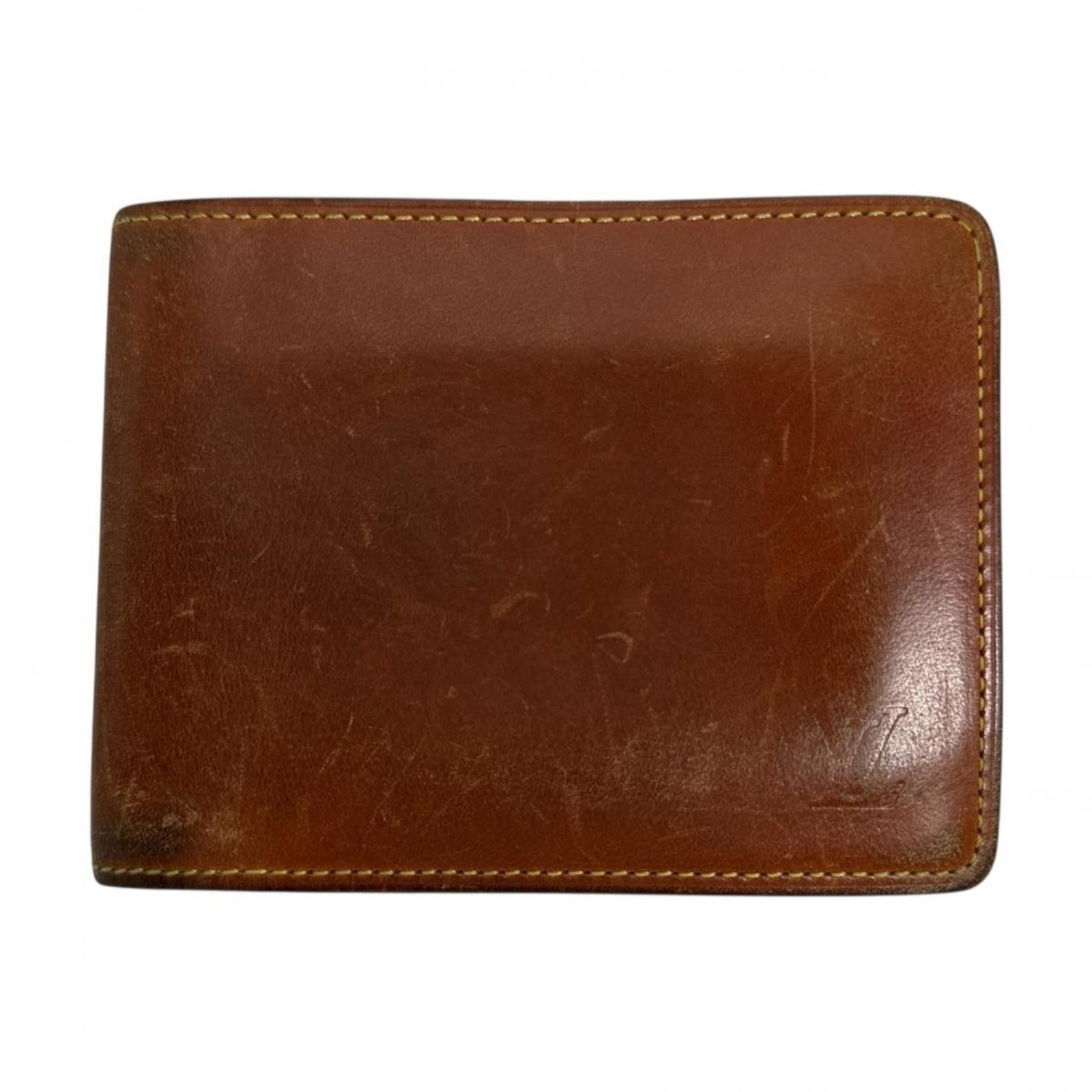 Louis Vuitton Wallet (Bi-Fold) Leather: Louis Vuitton Wallet (Bi-Fold) Leather The Louis Vuitton Porto Viejo bi-fold wallet features a rich brown leather exterior, showcasing the iconic monogram pattern. With its open design and multiple ca
