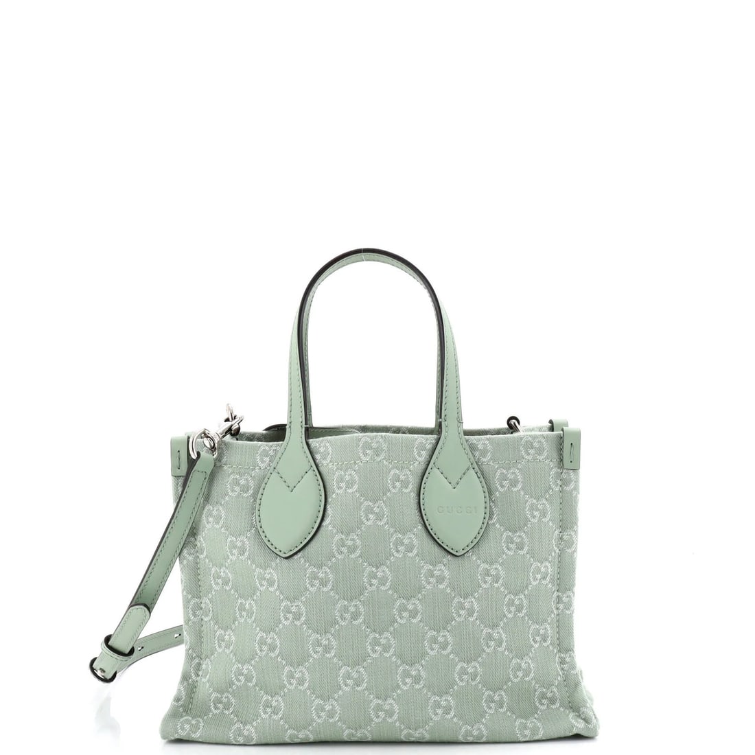 Gucci Ophidia Shopper Tote GG Denim Medium: Gucci Ophidia Shopper Tote GG Denim Medium The Gucci Ophidia Shopper Tote GG Denim Medium boasts a striking green denim exterior, complemented by a silver pochette base shaper with strap. Measuring