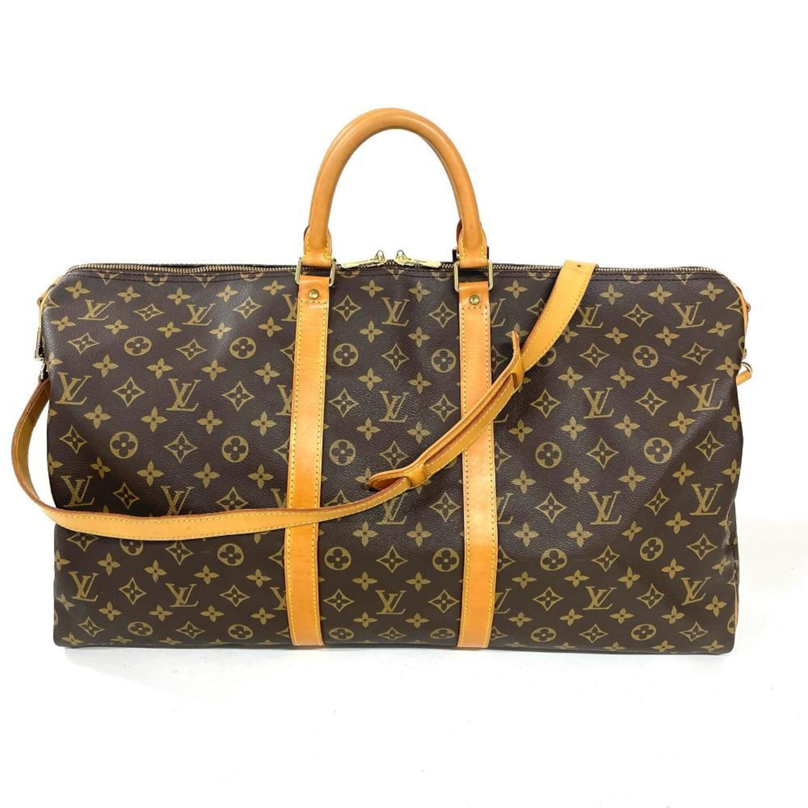 Boston Bag Monogram Canvas Louis Vuitton: Boston Bag Monogram Canvas Louis Vuitton Monogram canvas Louis Vuitton's Boston bag boasts a classic design with a timeless appeal, featuring the iconic monogram pattern in brown. Made from