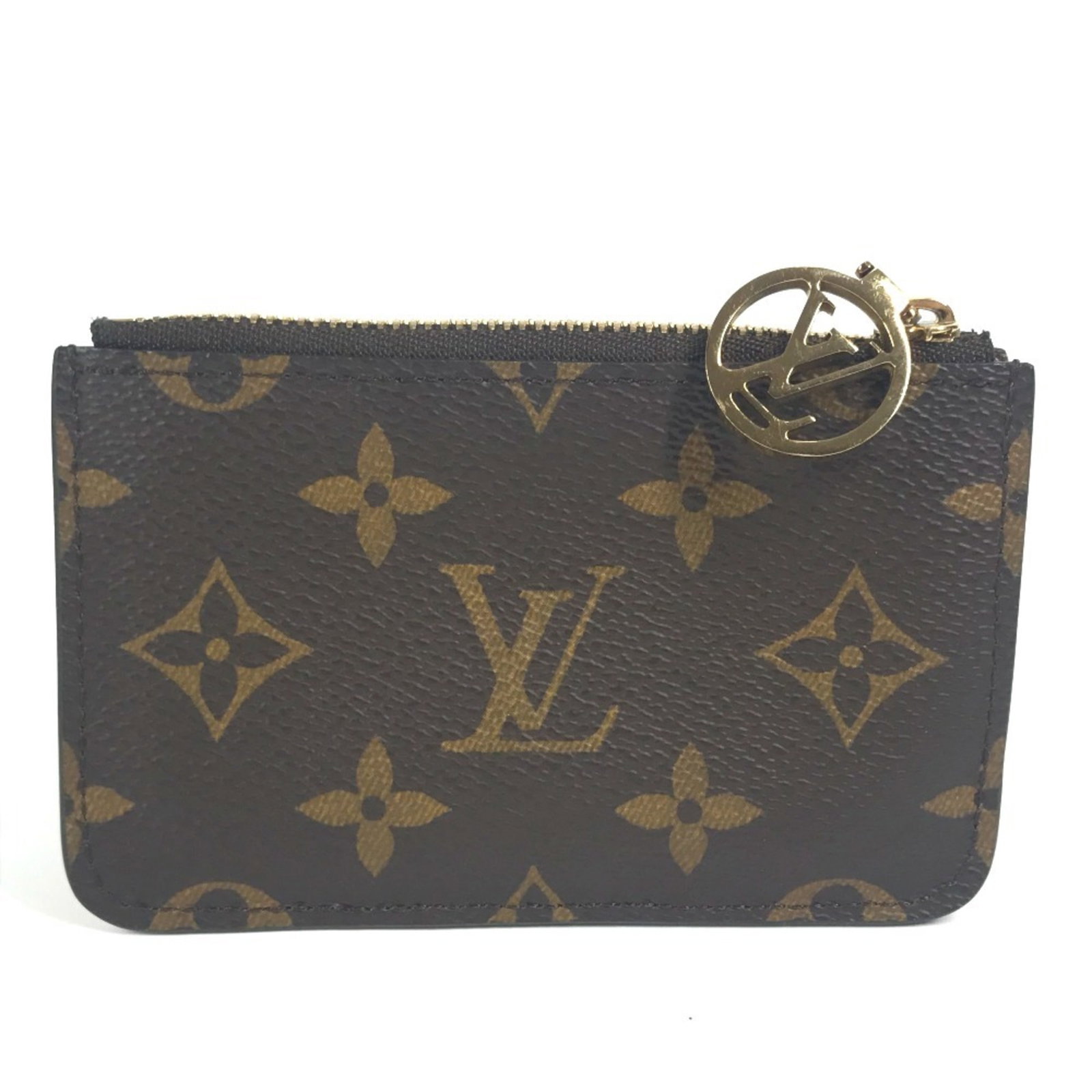 Business Card Case Monogram Louis Vuitton: Business Card Case Monogram Louis Vuitton Monogrammed with iconic Louis Vuitton style, this business card case boasts a timeless design and rich brown color. Made from high-quality materials, its comp