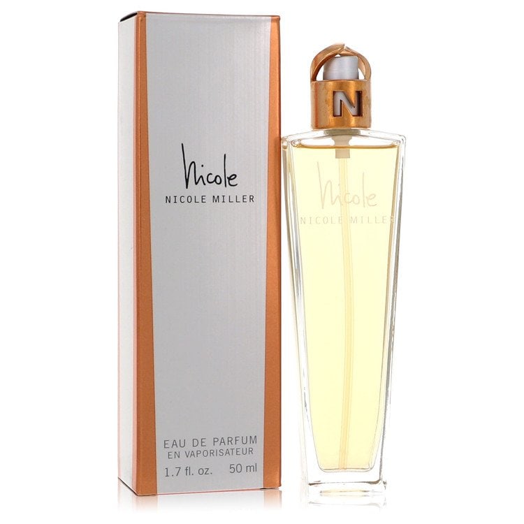 Nicole by Nicole Miller Eau De Parfum Spray 1.7 oz: Nicole by Nicole Miller Eau De Parfum Spray 1.7 oz Nicole by Nicole Miller Eau De Parfum Spray is a refreshing, flowery fragrance launched in 1998. This feminine scent features a blend of rich