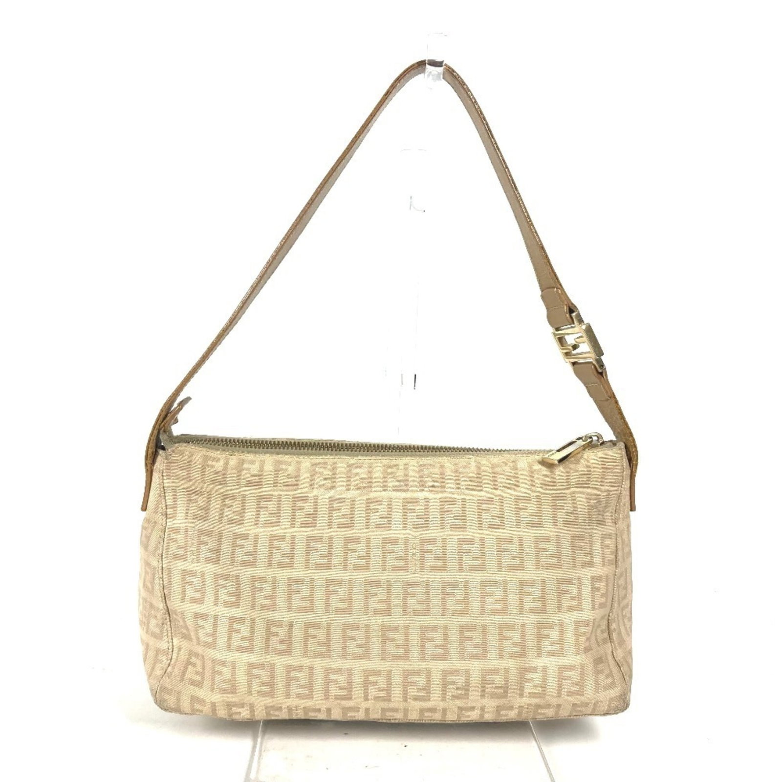 Canvas leather shoulder bag by Fendi: Canvas leather shoulder bag by Fendi Canvas leather shoulder bag by Fendi, featuring a unique blend of materials and a classic design. This beige-colored bag measures 14cm x 24.5cm x 9.5cm and has no