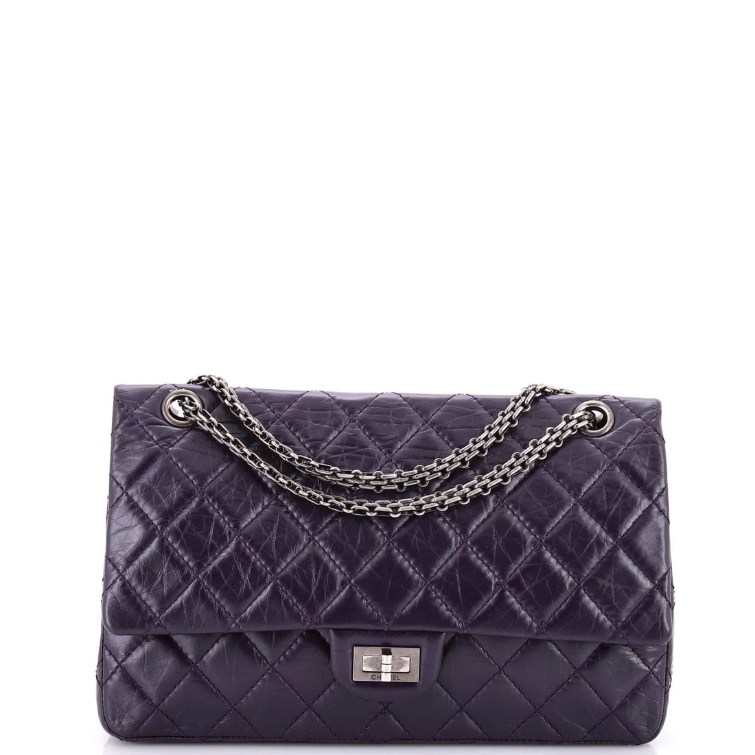 Chanel Reissue 2.55 Flap Bag Quilted Aged Calfskin 226: Chanel Reissue 2.55 Flap Bag Quilted Aged Calfskin 226 The Chanel Reissue 2.55 Flap Bag Quilted Aged Calfskin 226 boasts a rich, deep purple exterior with subtle scuffs and creases that add to its