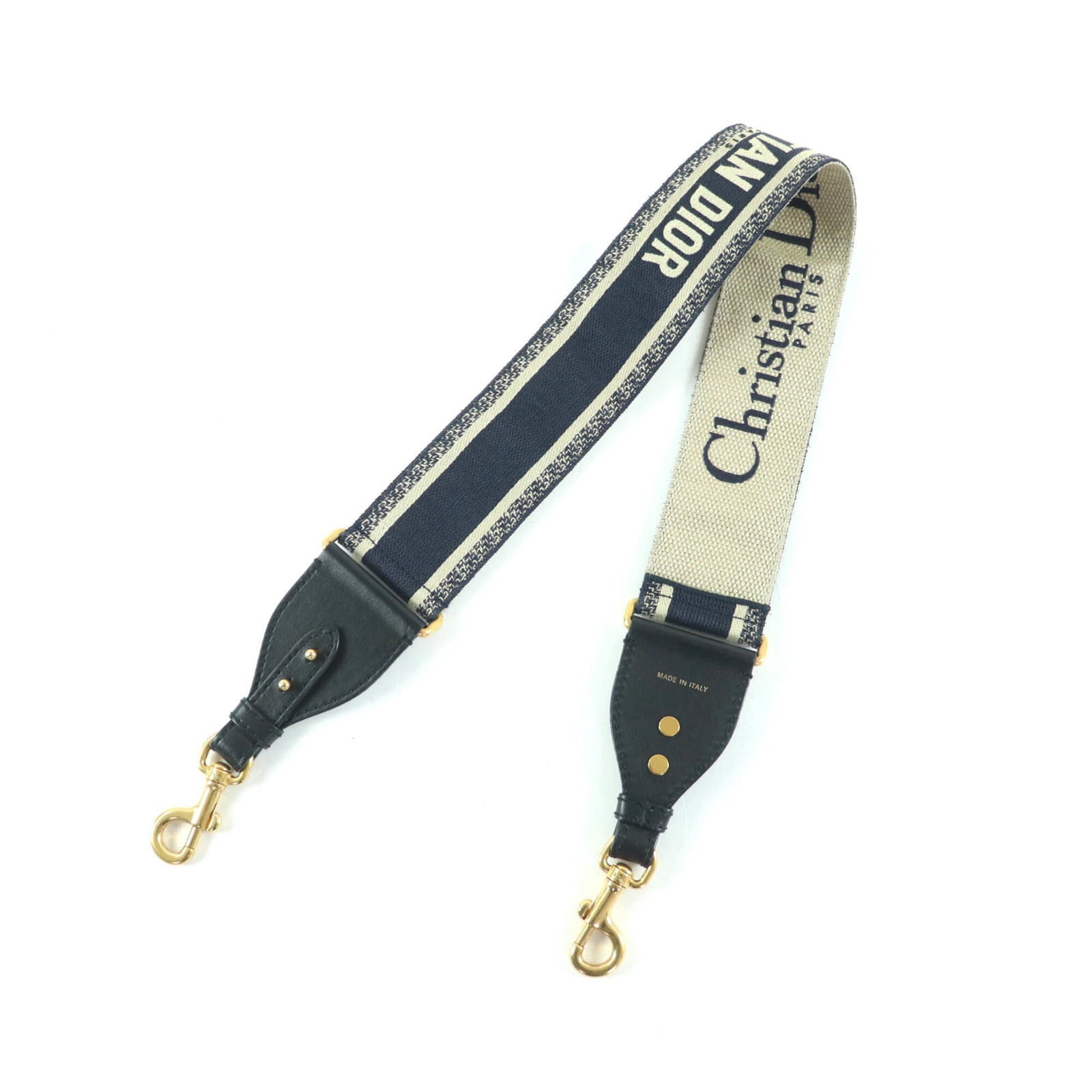 STRAP CANVAS CHRISTIAN DIOR LEATHER: STRAP CANVAS CHRISTIAN DIOR LEATHER Strap canvas Christian Dior leather, made from high-quality materials, features a unique beige and navy color combination. The item measures 94cm x 6.3cm / 37'' x