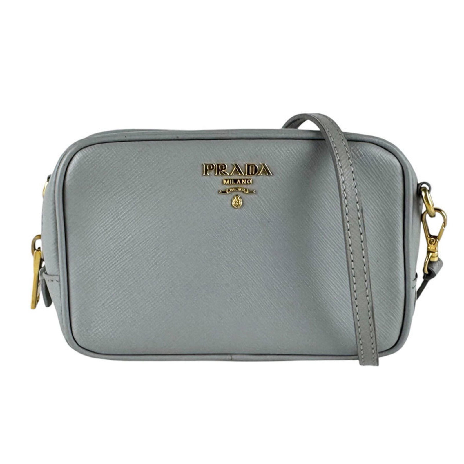 Shoulder Bag Leather by Prada: Shoulder Bag Leather by Prada The Prada MPN 1N1674 Shoulder Bag features a sleek gray leather design, measuring 10cm x 15cm x 5cm. This stylish bag boasts a classic shoulder strap and compact