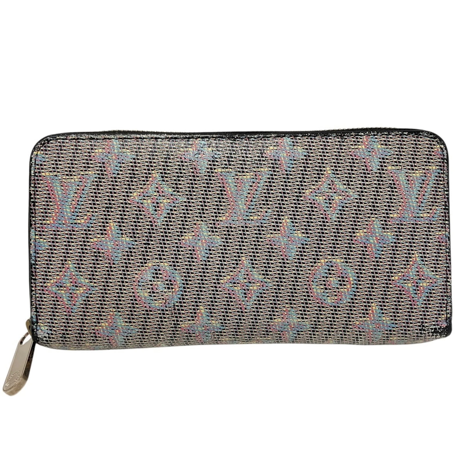 PVC bi-fold wallet from Louis Vuitton: PVC bi-fold wallet from Louis Vuitton PVC bi-fold wallet from Louis Vuitton, featuring the iconic Monogram pattern in multi-color hues. Made from PVC material, this long wallet measures 19.5cm x