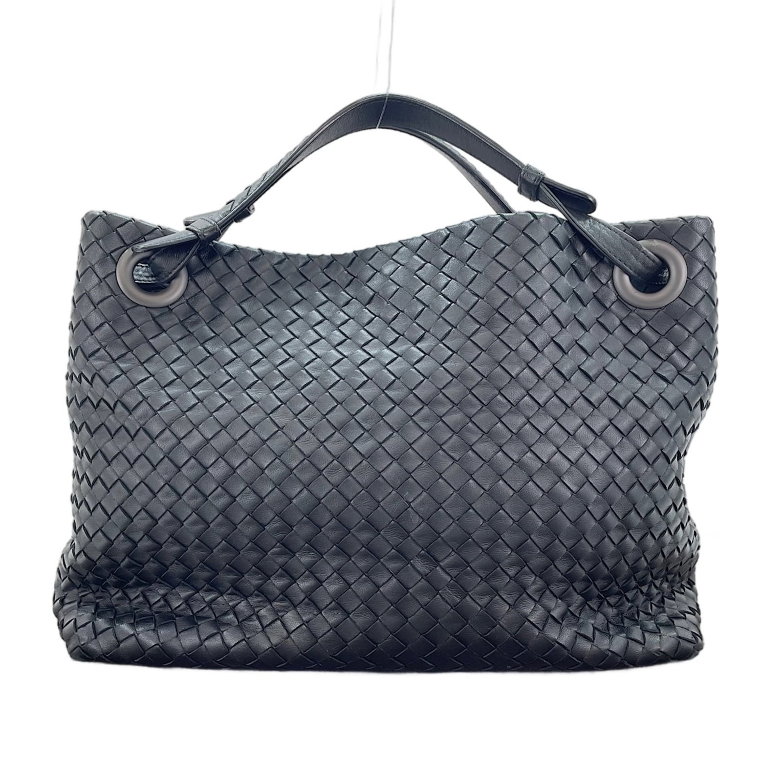 Bottega Veneta Handbag: Bottega Veneta Handbag Bottega Veneta's sleek black handbag boasts a sophisticated design, with clean lines and a compact size. Measuring 26cm x 33cm x 14cm, it offers ample space for everyday