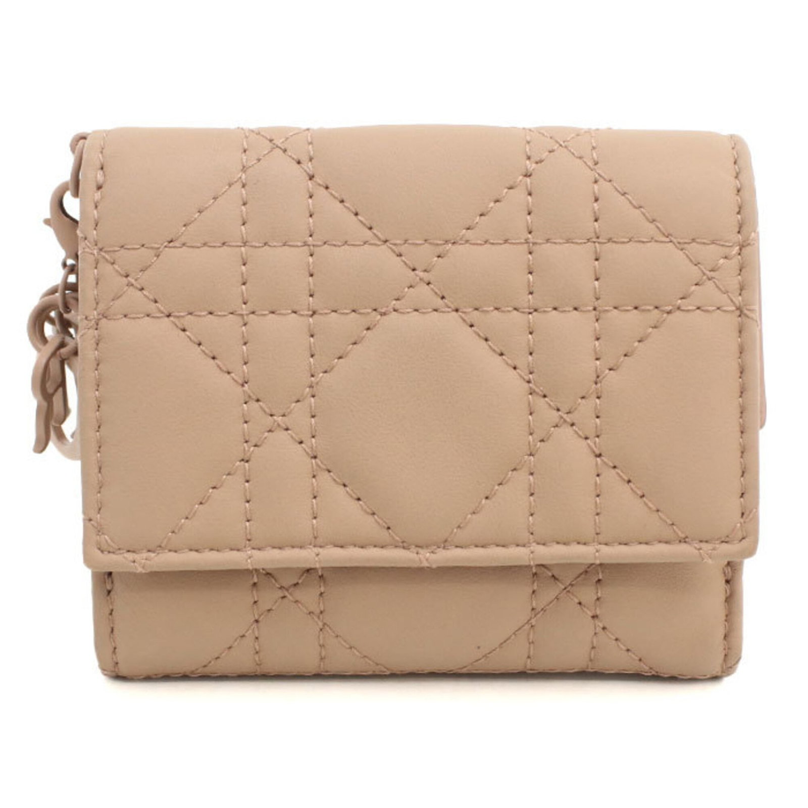 Christian Dior Wallet (Tri-Fold) Leather: Christian Dior Wallet (Tri-Fold) Leather Tri-fold leather wallet from Christian Dior, crafted in Italy with lambskin material and featuring a classic beige color. This elegant design measures 8.5cm x