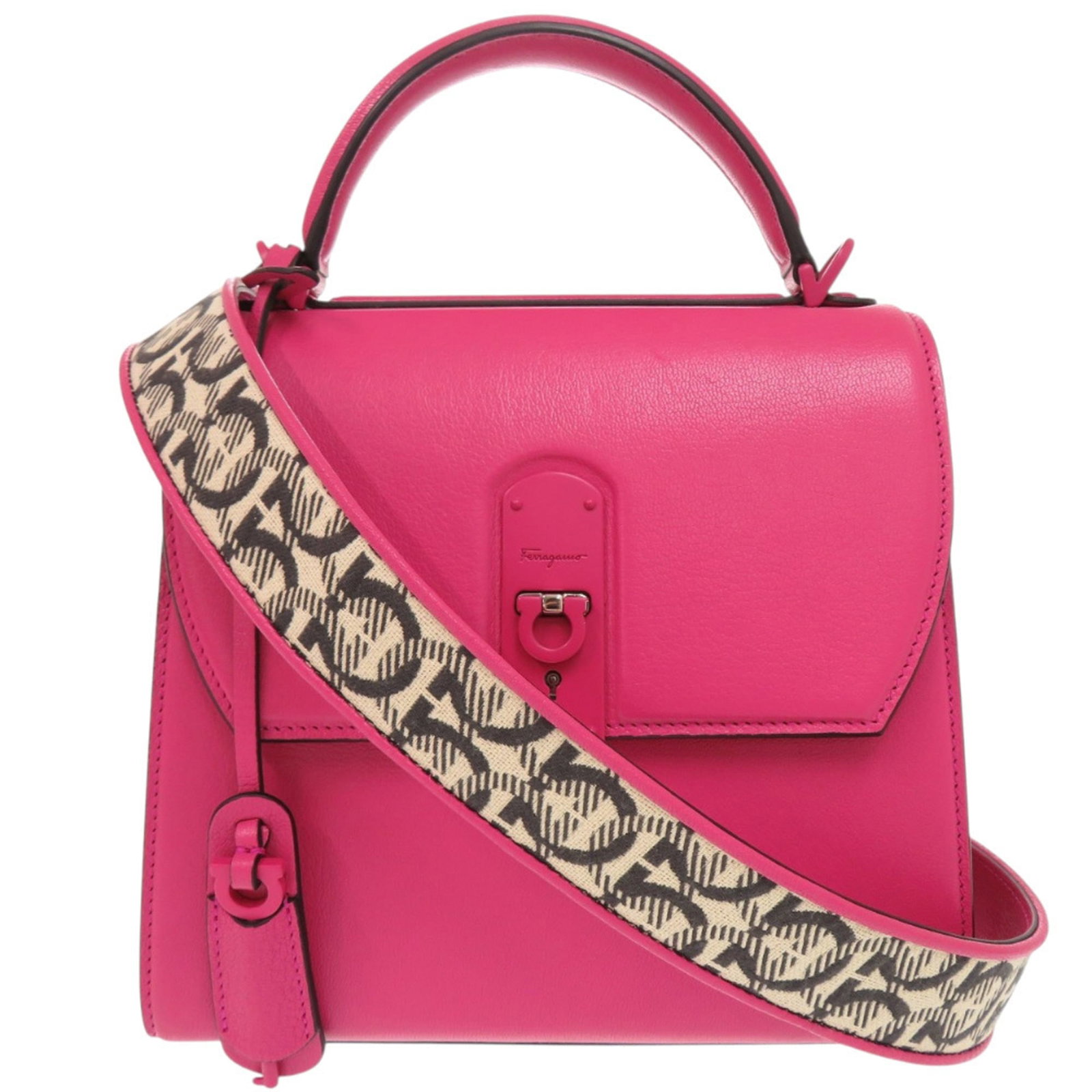 Shoulder bag leather handbag Salvatore Ferragamo: Shoulder bag leather handbag Salvatore Ferragamo The Salvatore Ferragamo shoulder bag boasts sleek, structured design with its leather and canvas material combination. Measuring 20cm x 22cm x 11cm, it