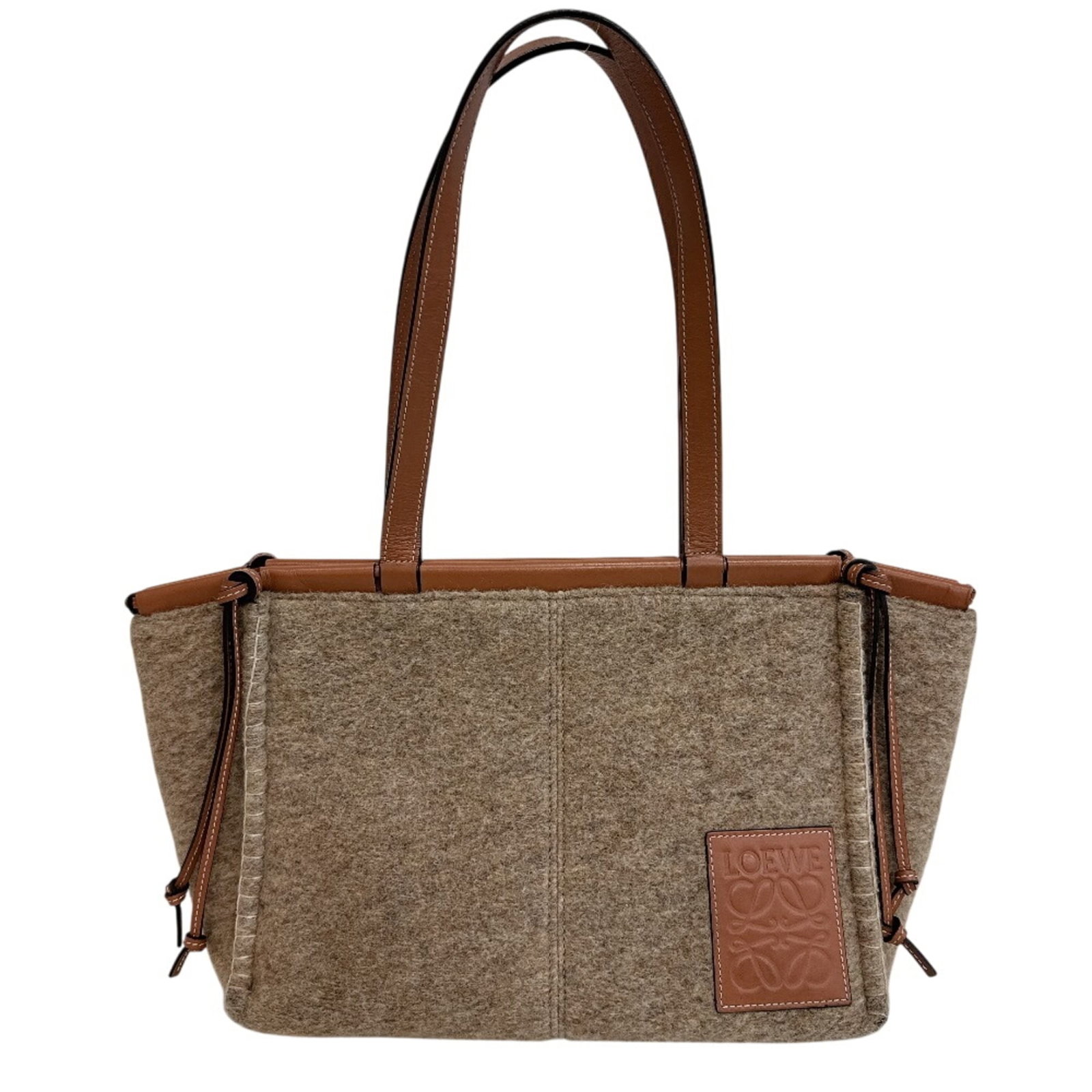 Wool Leather Loewe Bag Tote Shoulder: Wool Leather Loewe Bag Tote Shoulder Wool and leather blend in this unique shoulder tote from Loewe, boasting a natural beige color with a subtle brown undertone. The bag measures 24cm x 36cm x