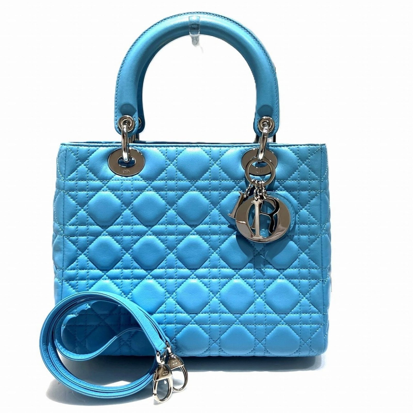 Handbag Christian Dior Leather: Handbag Christian Dior Leather Sky blue leather handbag from Christian Dior, featuring a sizeable 19.5cm x 24.5cm x 12cm design with a sturdy build and classic style. This women's handbag boasts premi