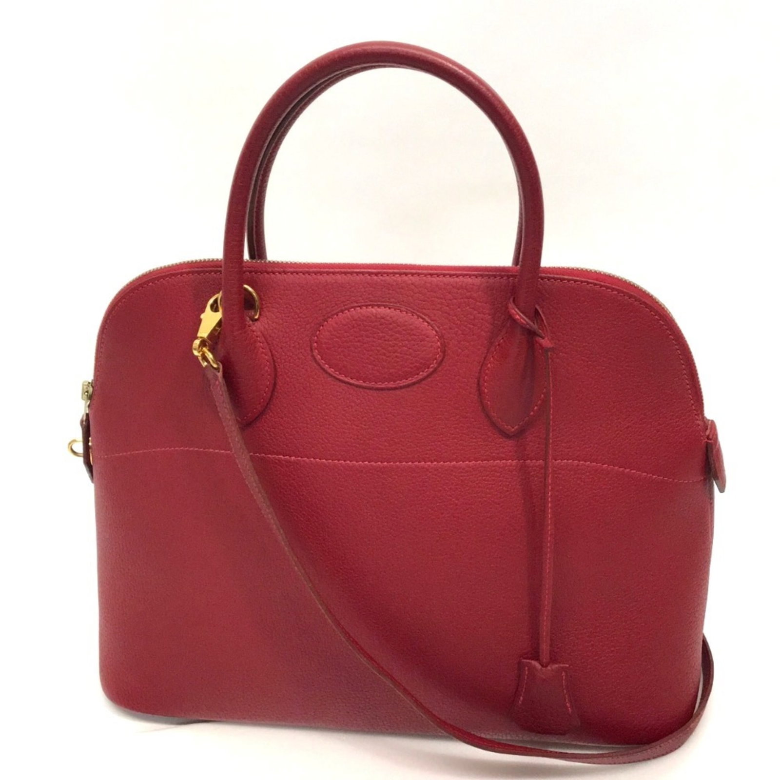 Fjord leather shoulder bag handbag Hermes: Fjord leather shoulder bag handbag Hermes Red Fjord leather Bolide shoulder bag from Hermes features gold hardware, zipper closure, and an open pocket for organization. The bag's sleek design and vibr