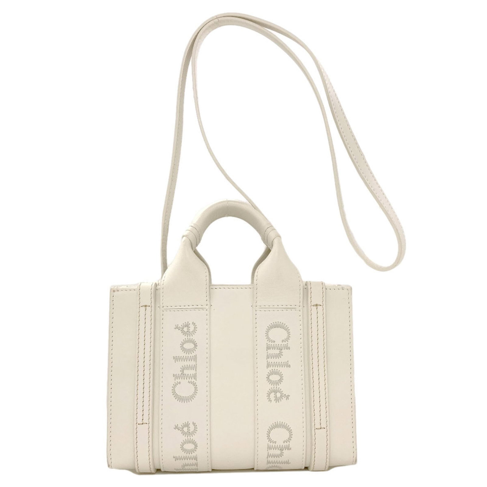 Handbag Leather: Handbag Leather White Calfskin Handbag Made from High-Quality Leather. This stylish handbag measures 14.5cm x 20cm x 7cm and features a classic design with clean lines and a sleek finish. Its durable 