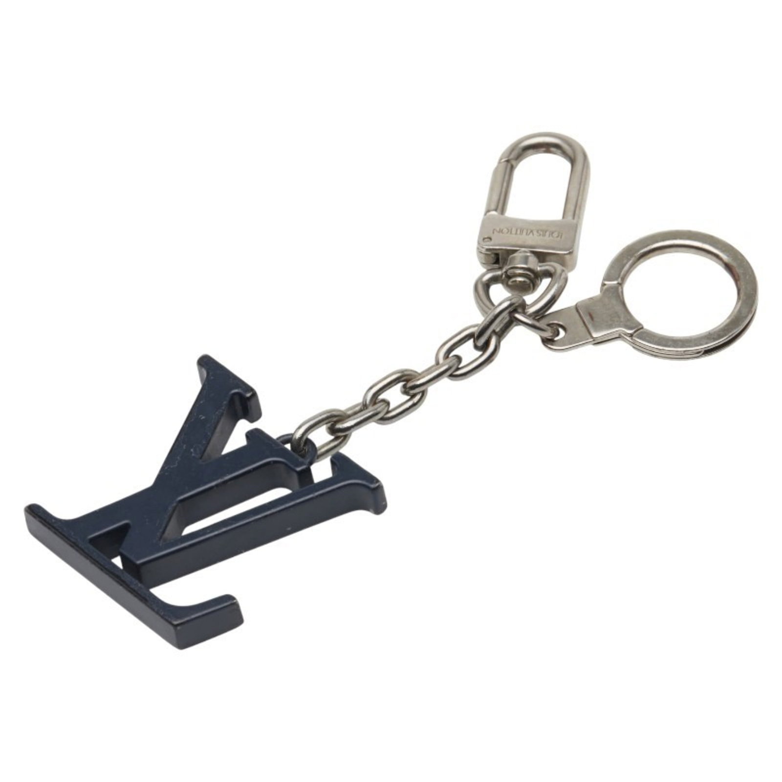 Keyring Metal By Louis Vuitton: Keyring Metal By Louis Vuitton The Louis Vuitton metal keyring boasts a sleek, navy design. Made from high-quality metal, its compact size and precise dimensions make it a stylish accessory for everyd