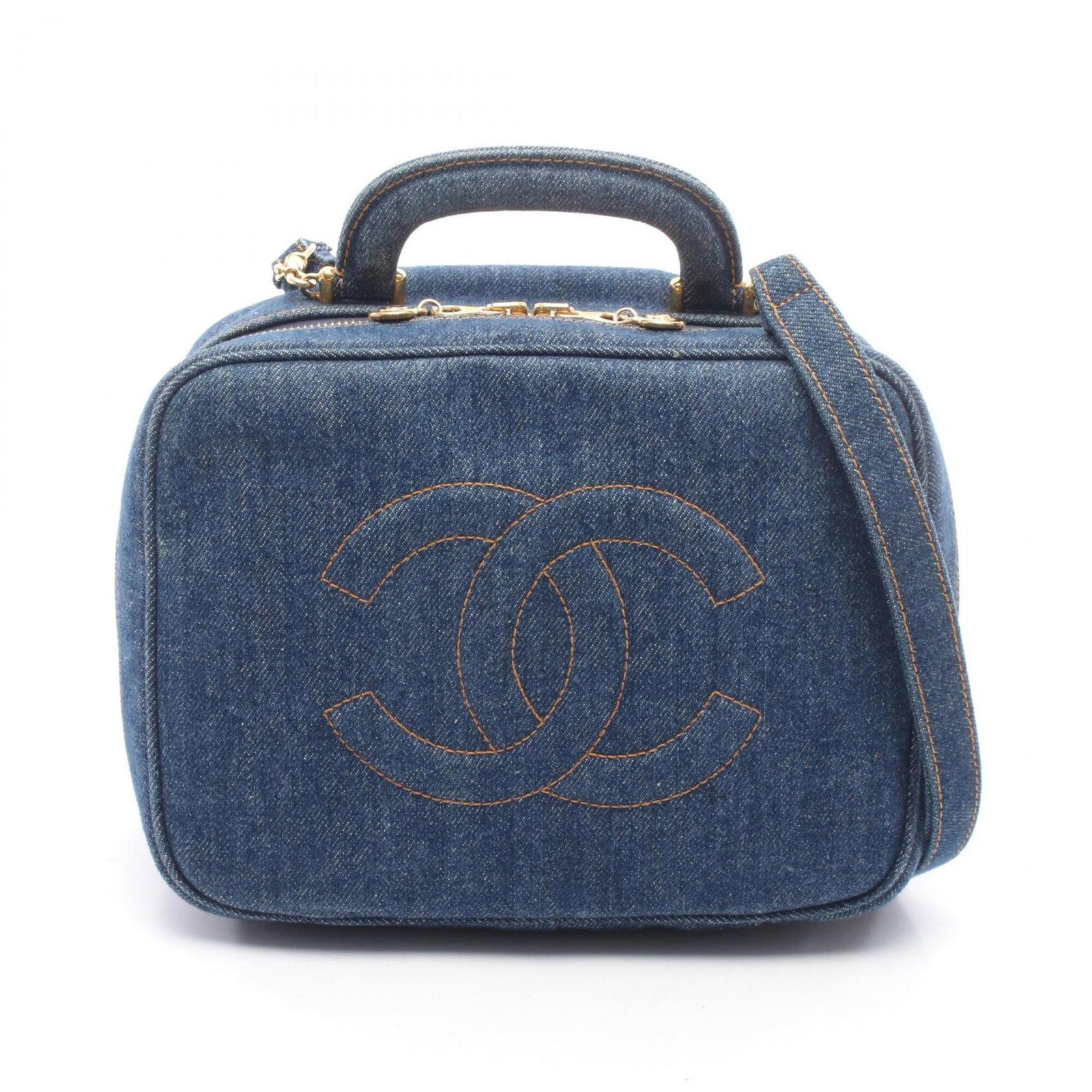 Chanel denim handbag: Chanel denim handbag Navy blue denim handbag from Chanel, measuring 18cm x 23cm x 10cm. This classic style features a durable denim material and signature design elements. The compact size makes it a