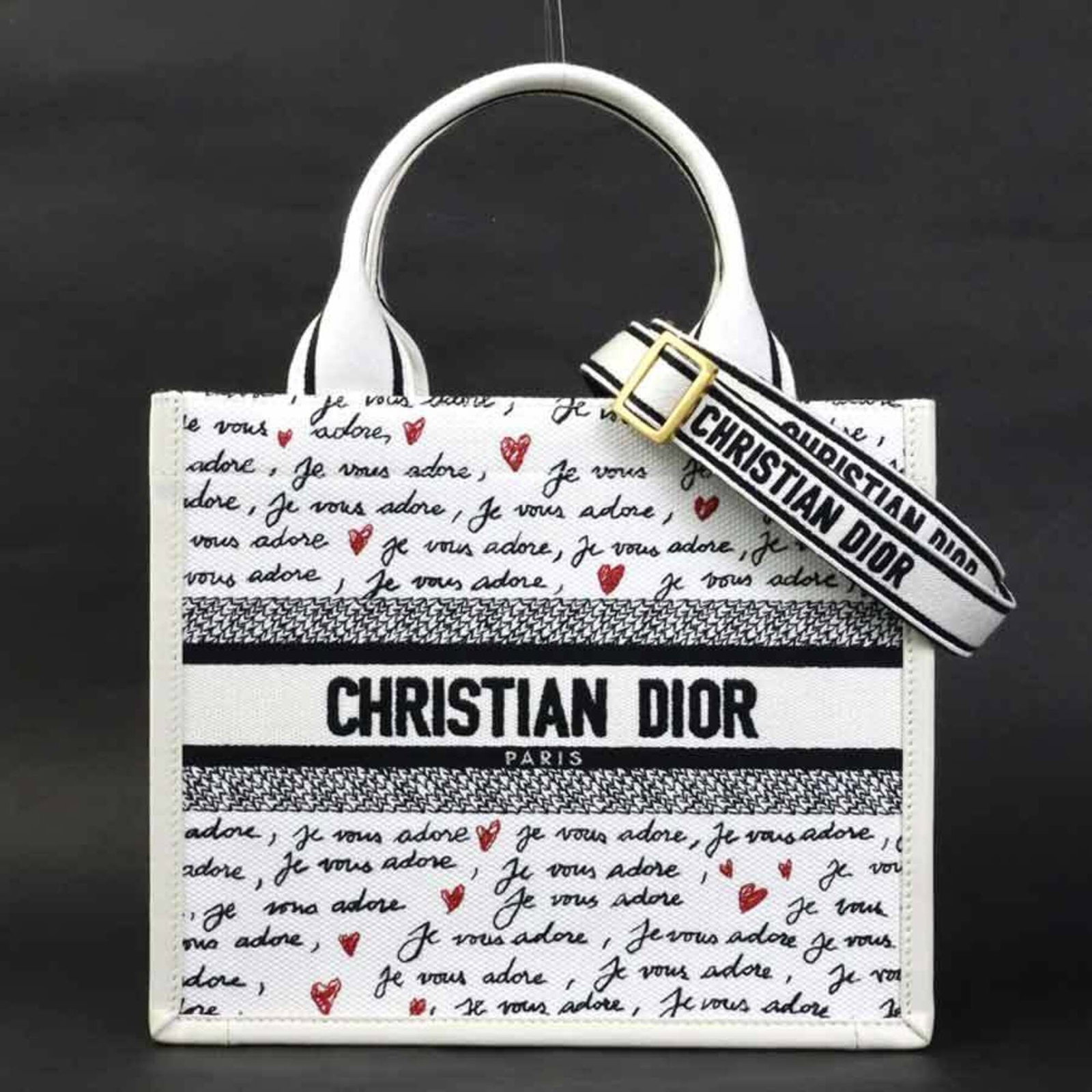 Christian Dior Handbag Canvas Leather Bag Shoulder: Christian Dior Handbag Canvas Leather Bag Shoulder Canvas and leather combine in sleek design, defining the Christian Dior Country shoulder bag. Measuring 22cm x 26cm x 12cm, its black, red, and