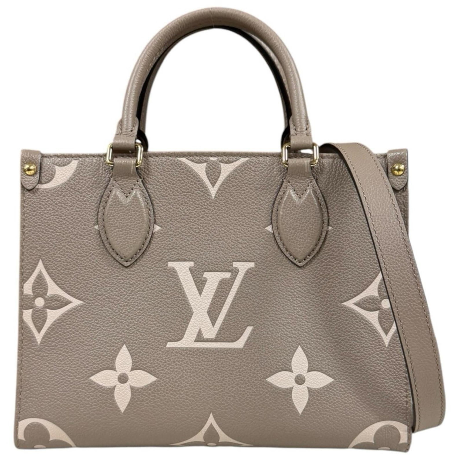 Shoulder bag monogram empreinte by Louis Vuitton: Shoulder bag monogram empreinte by Louis Vuitton Monogram Empreinte by Louis Vuitton, a classic shoulder bag from France, boasts the iconic Beige and Tourterelle color combination. Measuring 19cm x