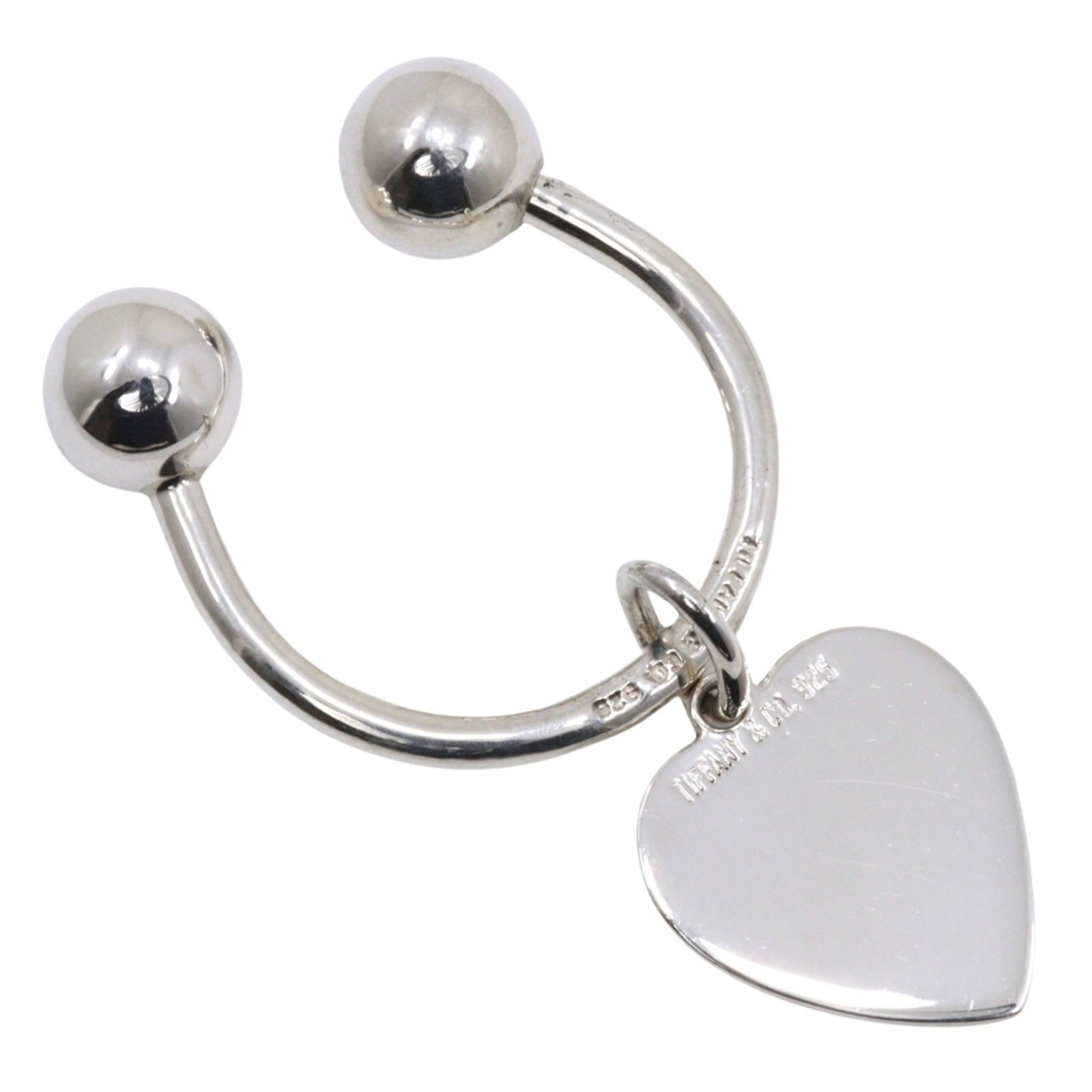 Tiffany & Co. Return To Keychain Heart Tag Silver 925 Women'S: Tiffany & Co. Return To Keychain Heart Tag Silver 925 Women'S Silver Tiffany & Co. Return To Keychain Heart Tag Pendant in 925, featuring a classic charm design with hearts pattern, made from
