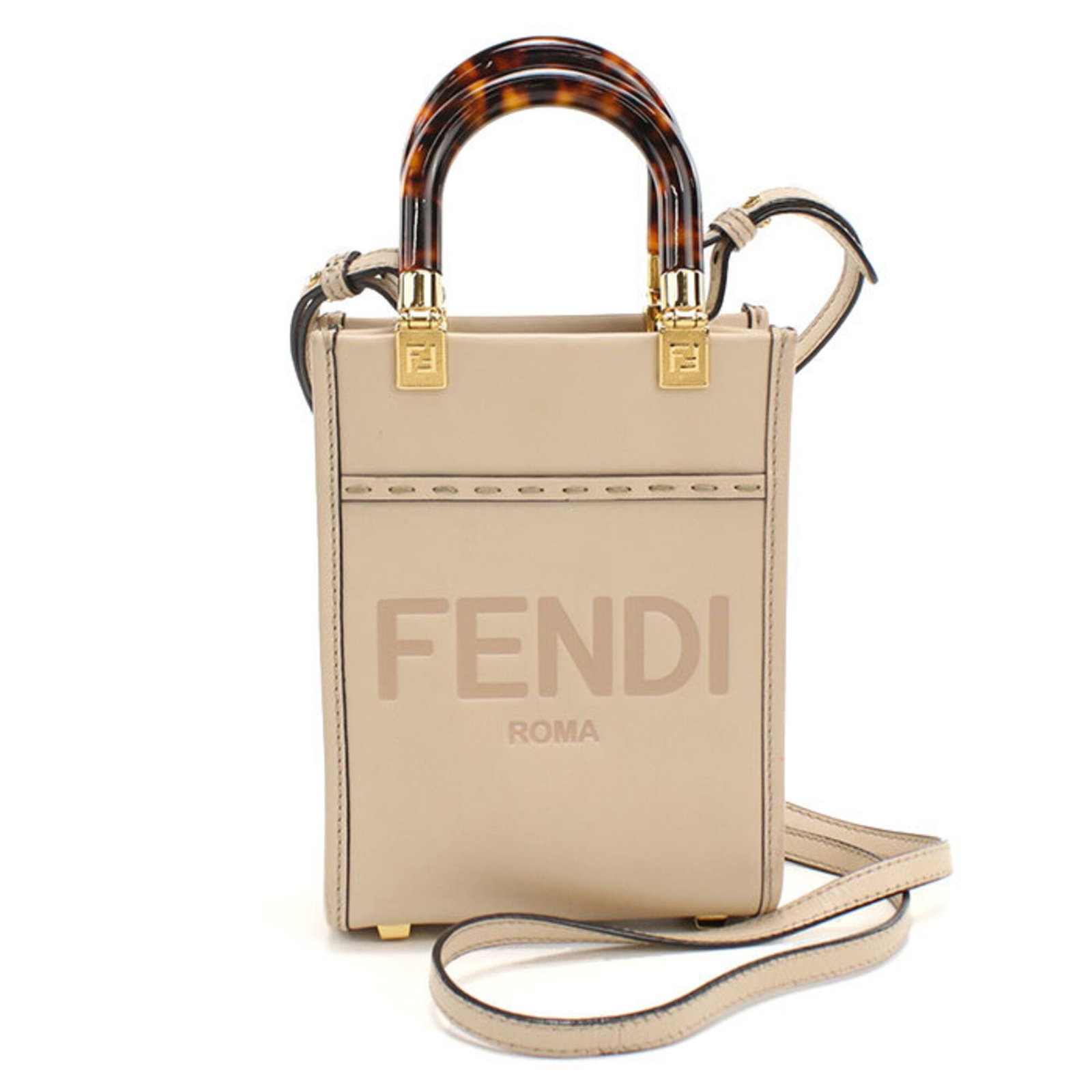 Fendi Handbag Leather: Fendi Handbag Leather The Fendi handbag features high-quality leather made from calfskin, with a beige color and gold hardware. This stylish bag measures 17cm x 13cm x 5cm and is designed for women.