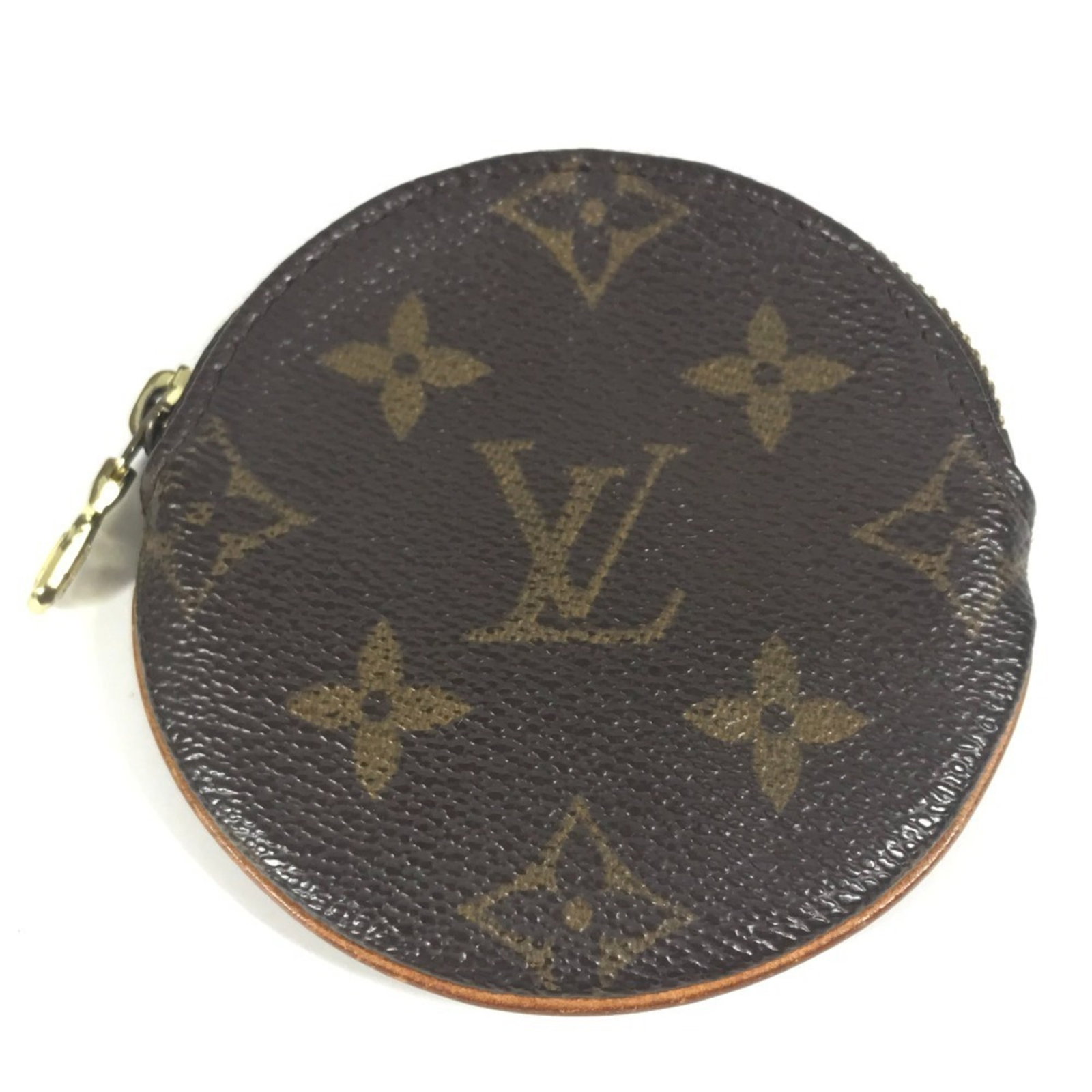 Louis Vuitton Purse Coin Case Monogram: Louis Vuitton Purse Coin Case Monogram The Louis Vuitton Monogram Coin Case is a compact, brown leather coin purse featuring the iconic monogram pattern. Made from high-quality materials, it measures 