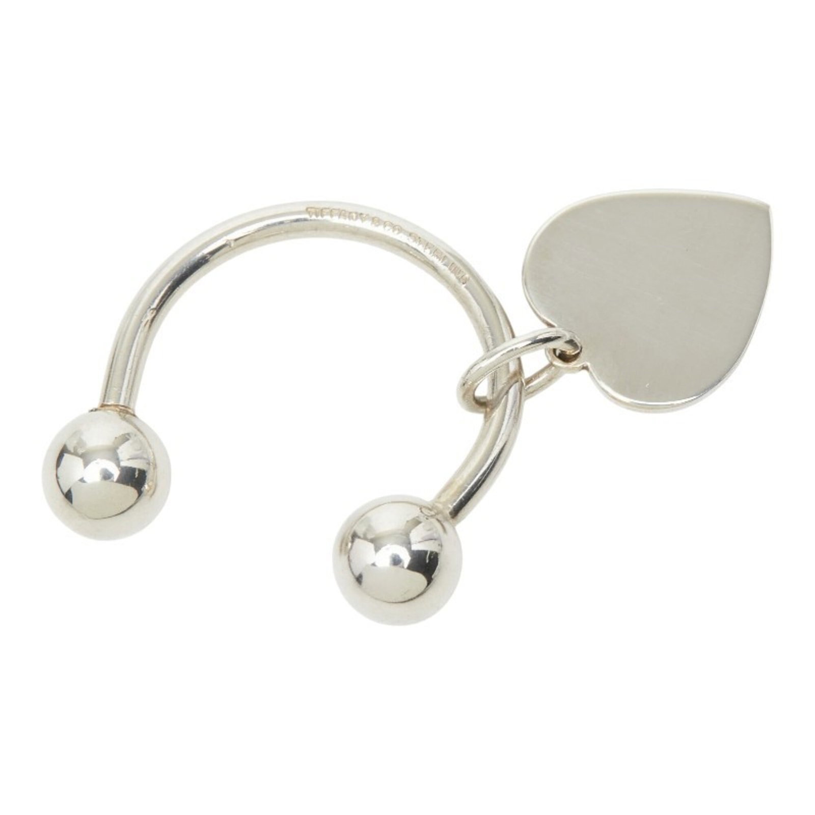 Tiffany silver keyring 925: Tiffany silver keyring 925 Tiffany silver keyring 925 features a charming heart pattern, crafted from high-quality sterling silver. The elegant design measures 30.4cm x 31.2cm / 11.96'' x 12.28'', mak