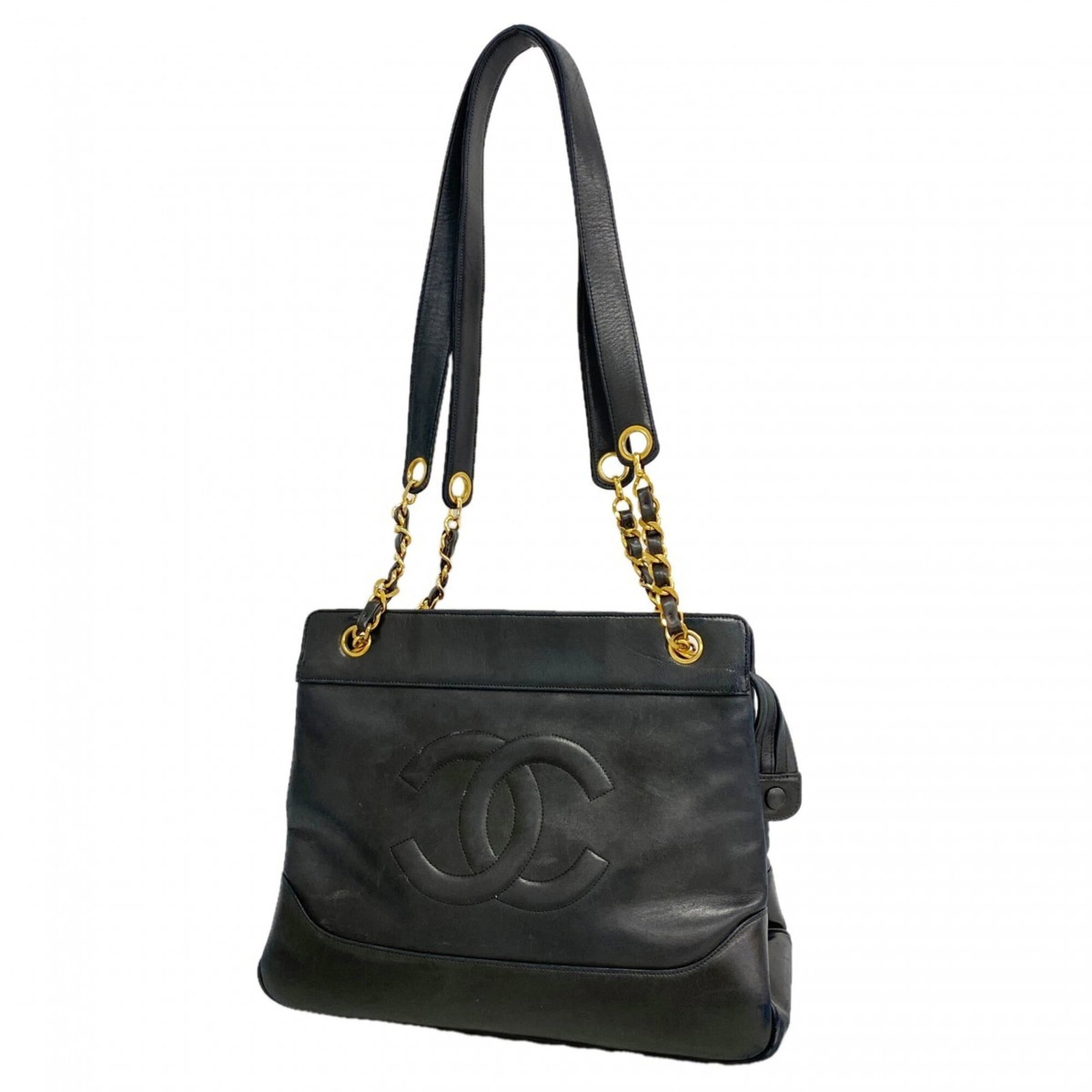 Chanel tote leather bag: Chanel tote leather bag Black lambskin Chanel tote bag with gold hardware, measuring 26cm x 33cm x 9.5cm, features a classic design and premium leather construction. Item Specifics: Brand: Chanel