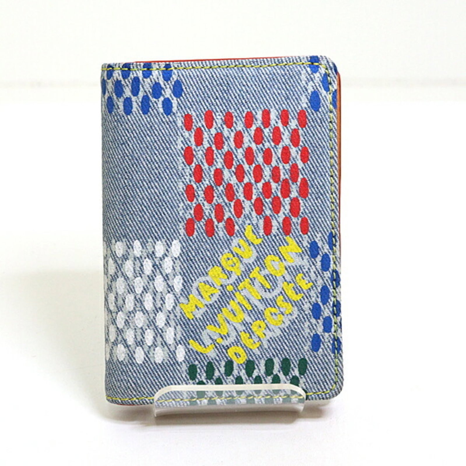 Leather Denim Card Case Louis Vuitton: Leather Denim Card Case Louis Vuitton This Louis Vuitton card case combines denim and leather in a unique, multi-color design. Made with durable materials and featuring a compact size, it provides a