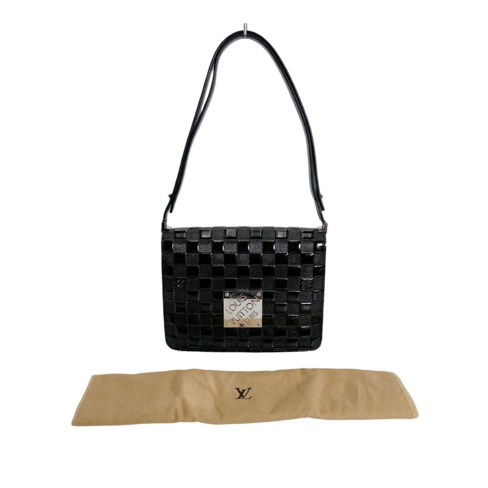 Shoulder Bag Leather Louis Vuitton: Shoulder Bag Leather Louis Vuitton Black Calf Leather Louis Vuitton Shoulder Bag with Enamel Details, featuring a classic design and durable construction. This stylish bag measures 18cm x 21.5cm x