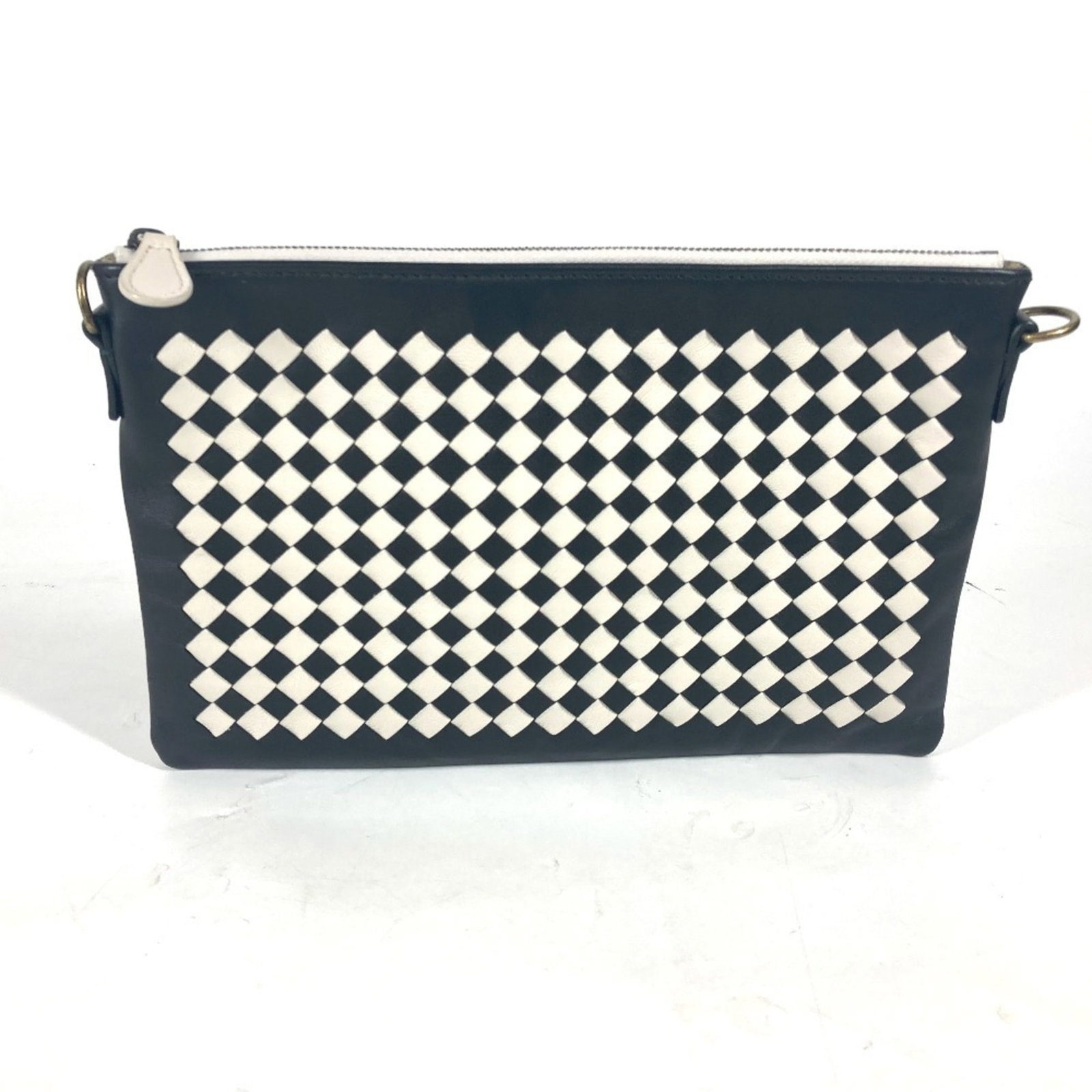 Bottega Veneta Clutch Bag Pochette Pouch Shoulder Bag Leather: Bottega Veneta Clutch Bag Pochette Pouch Shoulder Bag Leather Bottega Veneta's sleek Pochette Pouch Shoulder Bag boasts a sophisticated black leather design, measuring 15.5cm x 24cm / 6.1'' x 9.44''.