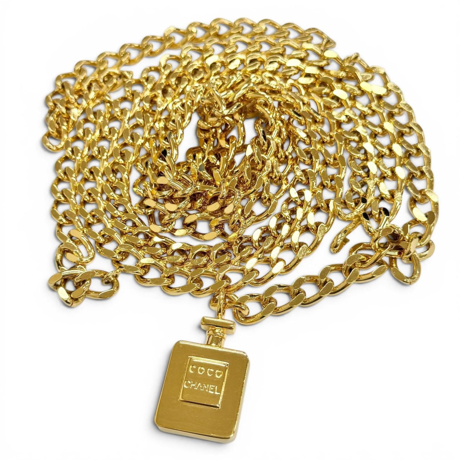 Chain Belt by Chanel: Chain Belt by Chanel Chain belt by Chanel, gold in length 80cm. This chain belt features the iconic design of Chanel. A staple accessory for those who appreciate timeless elegance. Item Specifics:
