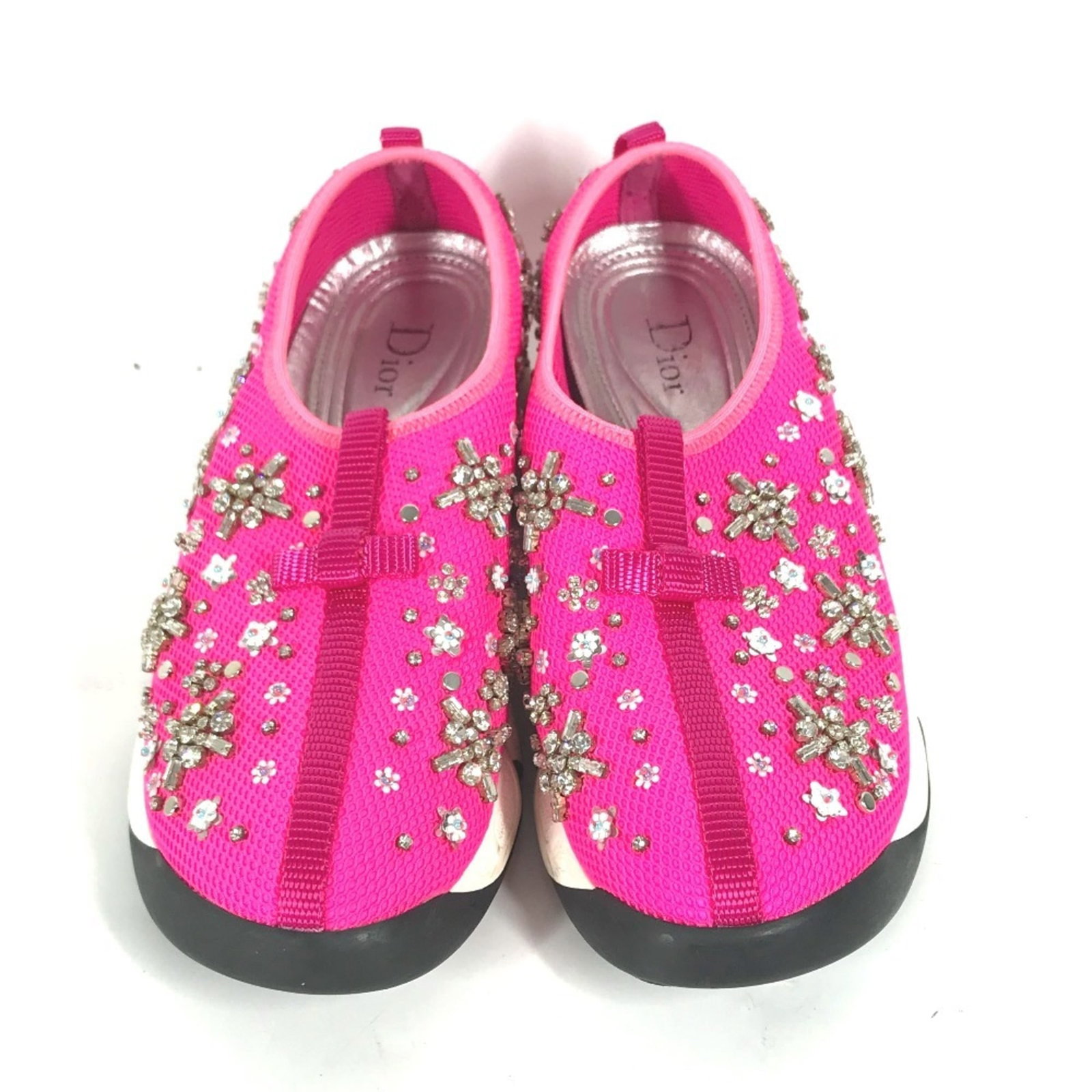Dior Sneakers by Christian: Dior Sneakers by Christian Pink Dior Sneakers with Mesh Upper and Dust Bag. Brought to you by Christian Dior, these women's sneakers feature a striking pink hue and mesh upper material. Includes a