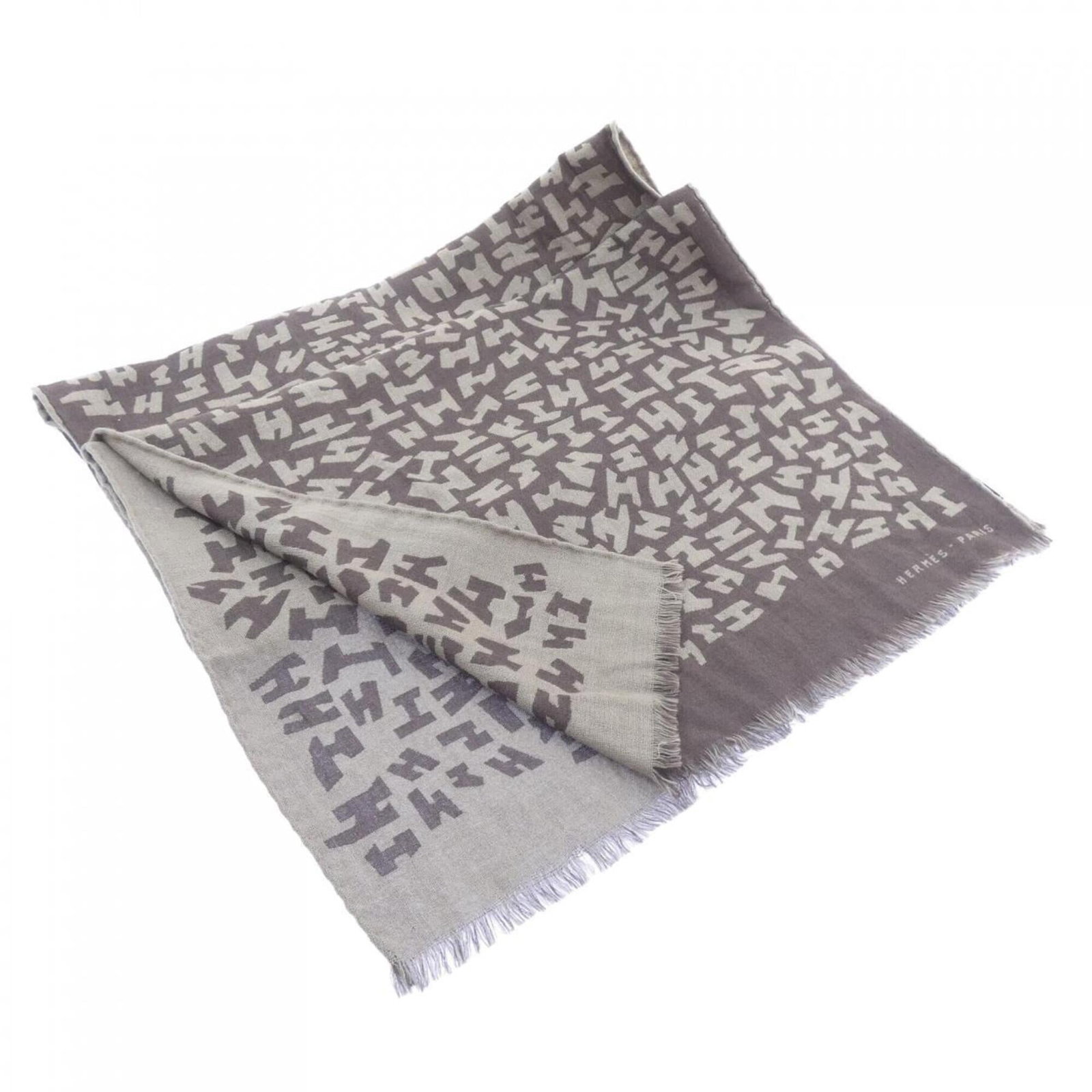 Silk cashmere shawl by Hermes: Silk cashmere shawl by Hermes The Hermes silk cashmere shawl boasts a sumptuous blend of luxurious materials, carefully woven together to create a truly exceptional piece. Measuring 1.56m x 46cm in