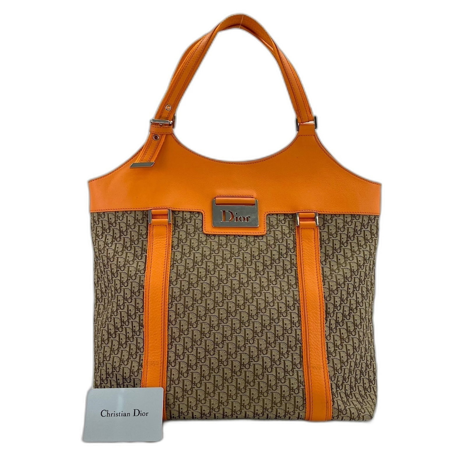 Tote Bag Canvas of Christian Dior: Tote Bag Canvas of Christian Dior Canvas tote bag from Christian Dior, featuring an iconic orange color and compact size. This canvas tote measures 30cm x 31cm x 13cm, making it a practical choice