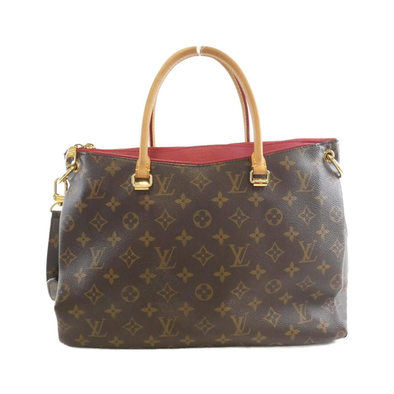 Canvas Coated Louis Vuitton Handbag: Canvas Coated Louis Vuitton Handbag Cerise and Marron hues blend in perfect harmony within the coated canvas of this Louis Vuitton handbag, showcasing the iconic M41175 design. The bag's gold