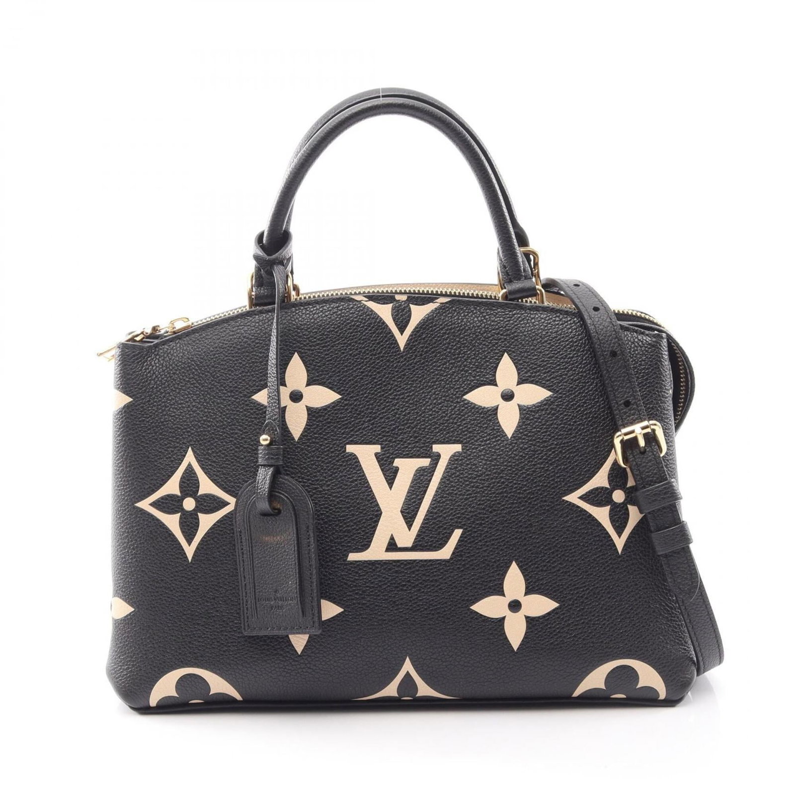 Louis Vuitton Handbag Leather: Louis Vuitton Handbag Leather Beige or Black Louis Vuitton Monogram Empreinte Leather Handbag. This stylish handbag features the iconic Monogram Empreinte pattern, made from high-quality leather and