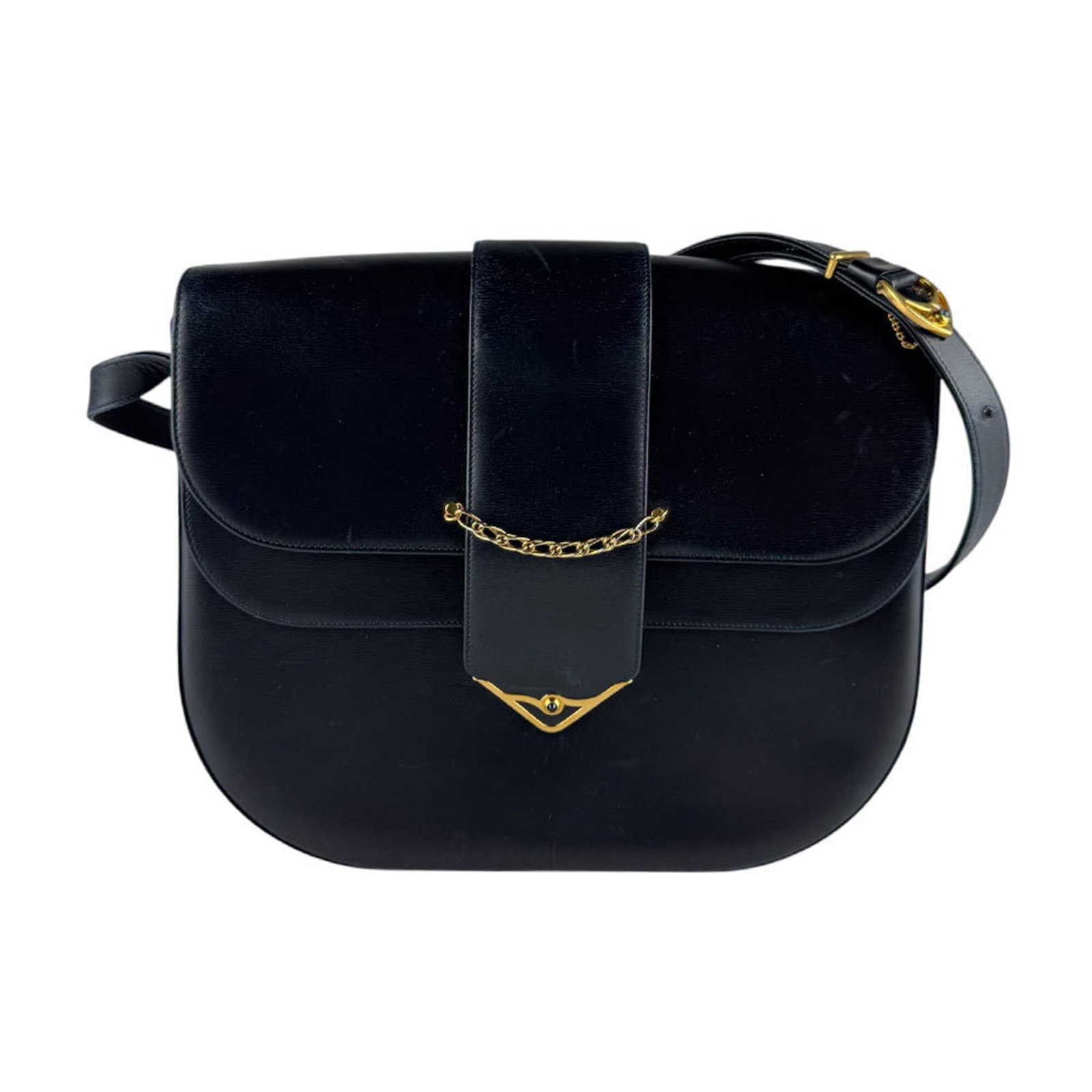 Shoulder Bag Leather by Cartier: Shoulder Bag Leather by Cartier This navy leather shoulder bag from Cartier features a classic design with clean lines and a timeless aesthetic. Made from high-quality leather, the bag measures 23cm