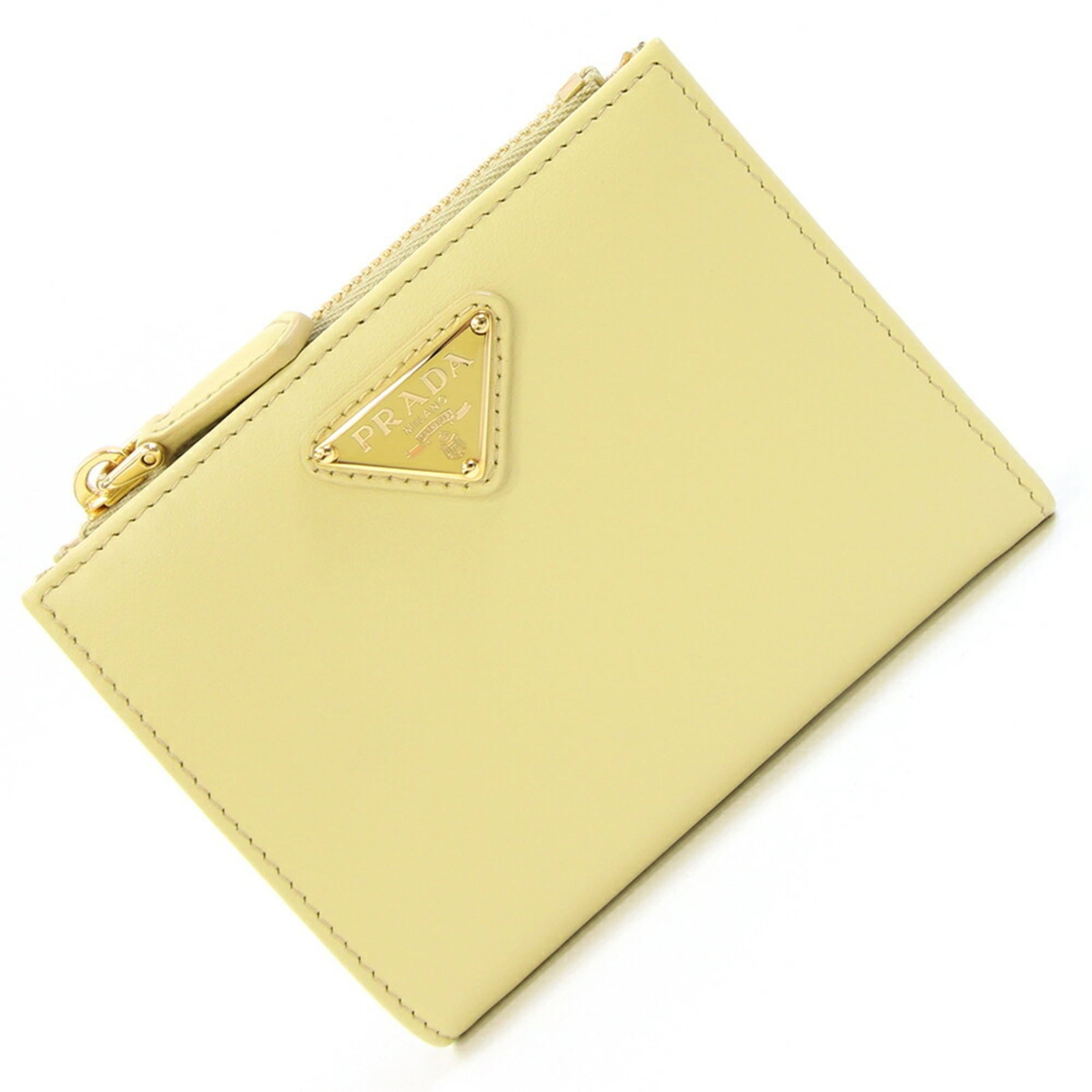 Prada Wallet (Bi-Fold) Leather: Prada Wallet (Bi-Fold) Leather Yellow Prada bi-fold leather wallet with dimensions 9cm x 11.5cm x 2.5cm, originating from Italy. This bi-fold wallet features high-quality leather material and a