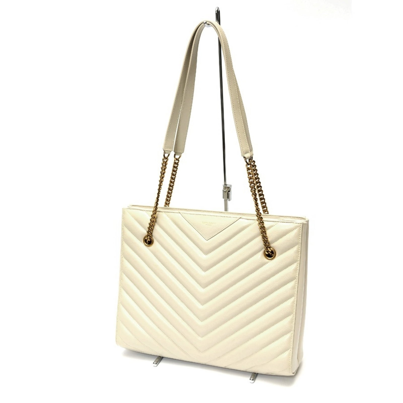 Saint Laurent Leather Shoulder Bag Tote: Saint Laurent Leather Shoulder Bag Tote The Saint Laurent Leather Shoulder Bag Tote boasts sleek, ivory leather with clean lines and classic design. This stylish tote features a durable construction