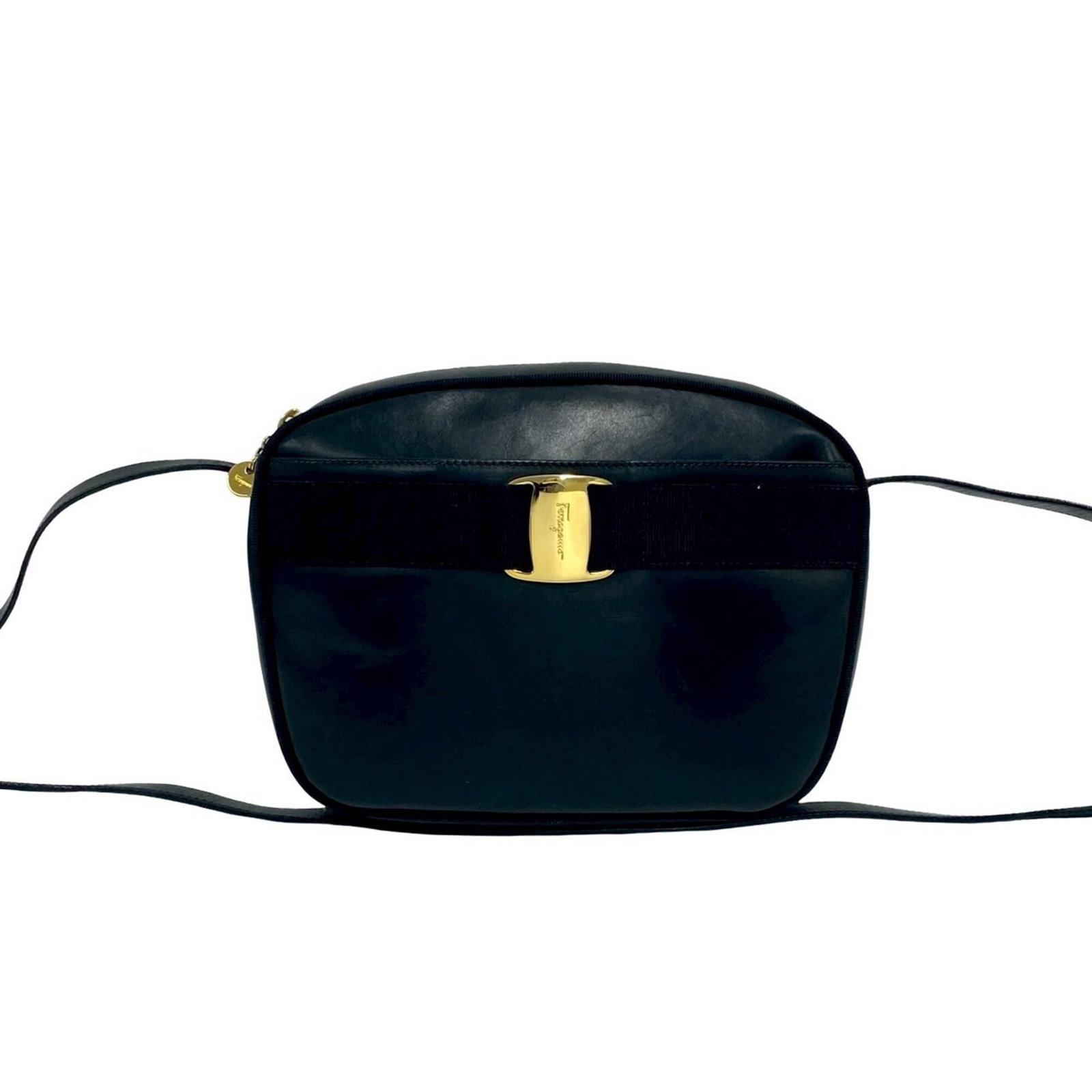 Ferragamo Leather Pochette Salvatore Bag Shoulder: Ferragamo Leather Pochette Salvatore Bag Shoulder Black leather pochette with shoulder strap, measuring 17cm x 20cm x 7cm. This Salvatore Ferragamo bag features classic design and elegant