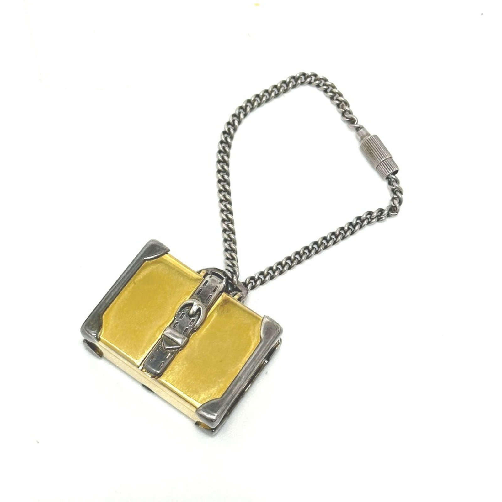 Key Chain Metal Gucci: Key Chain Metal Gucci Metal Key Chain from Gucci, crafted in Italy with a sleek black finish. This compact accessory measures 2.2cm x 3cm x 1.2cm and features a distinctive metal design. A small yet s