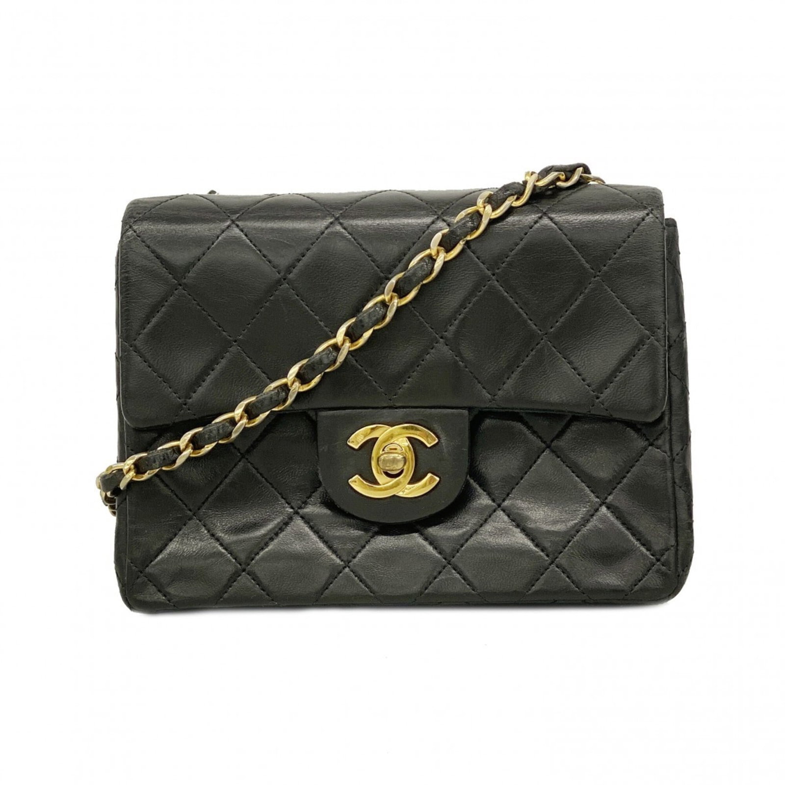 Shoulder Bag Leather Chanel: Shoulder Bag Leather Chanel This luxurious black leather shoulder bag from Chanel features elegant gold hardware and premium lambskin material, showcasing the brand's signature style. Measuring